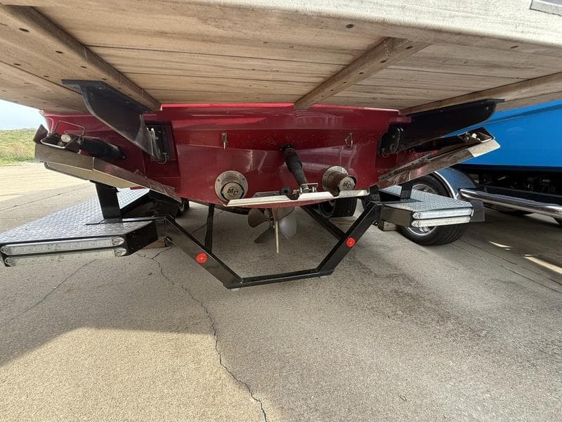 2016 MasterCraft X23 boat underside showing propeller and trailer.