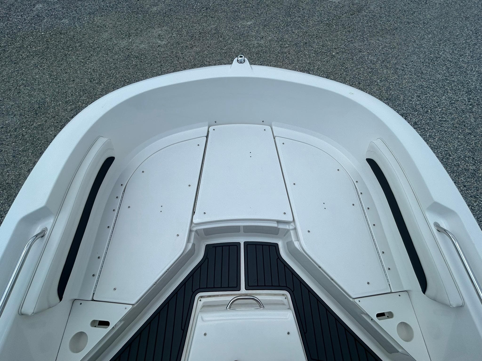 2022 Bayliner Trophy T20CX boat deck, white with black accents, spacious and modern design.