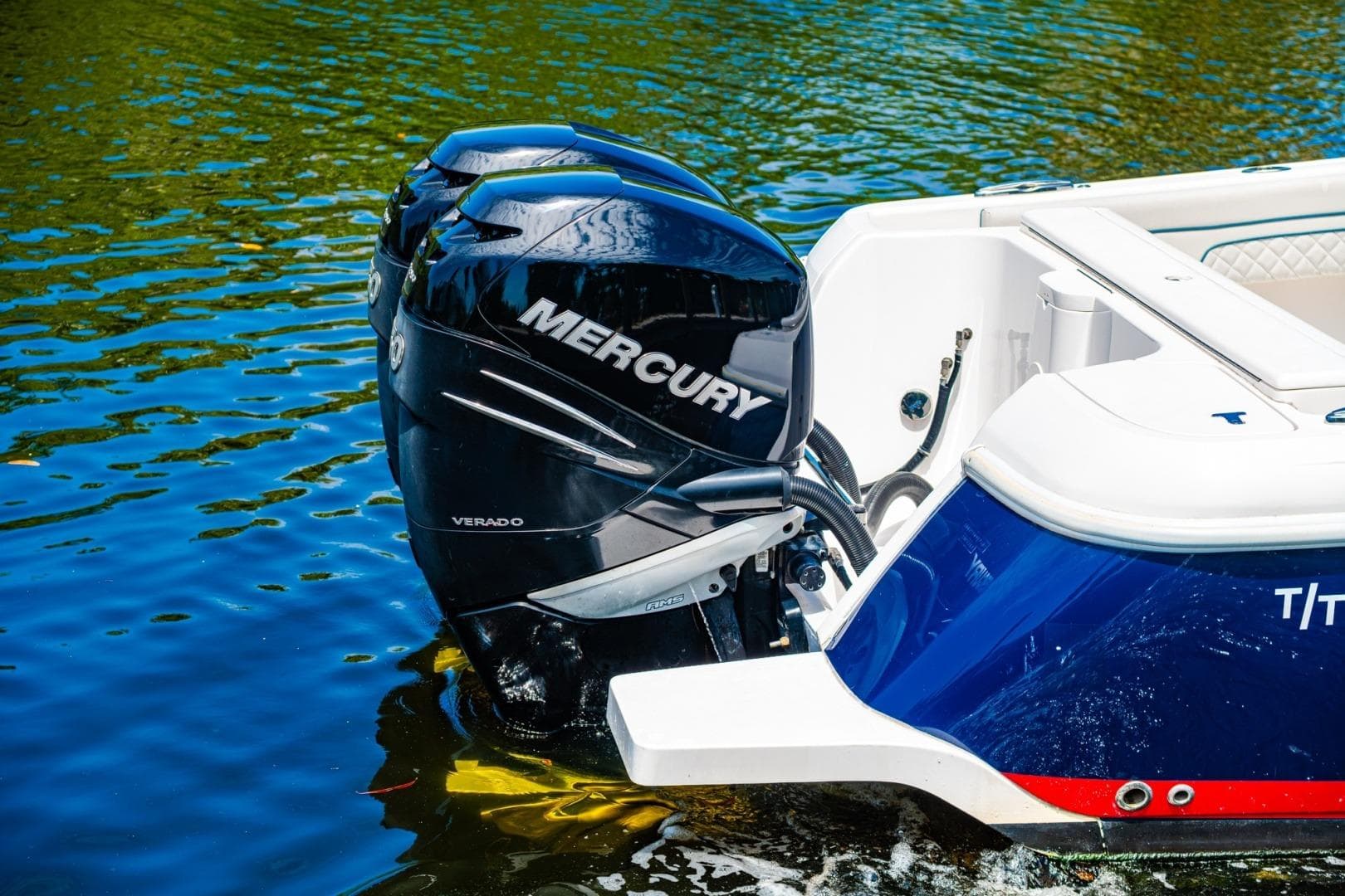 2018 Intrepid 327 Center Console with Mercury Verado engine on water.