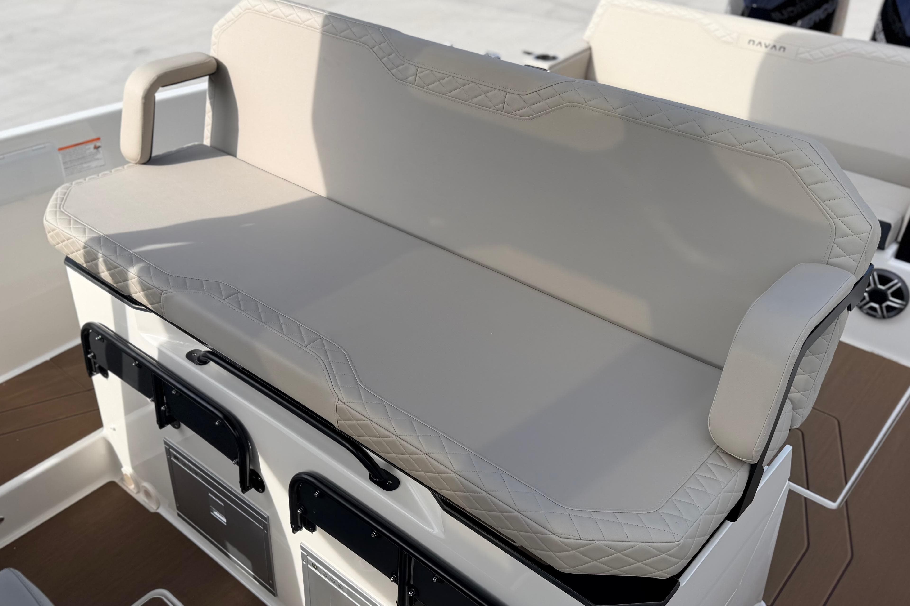 Luxurious seating on 2026 Navan S30 boat, featuring elegant beige upholstery.