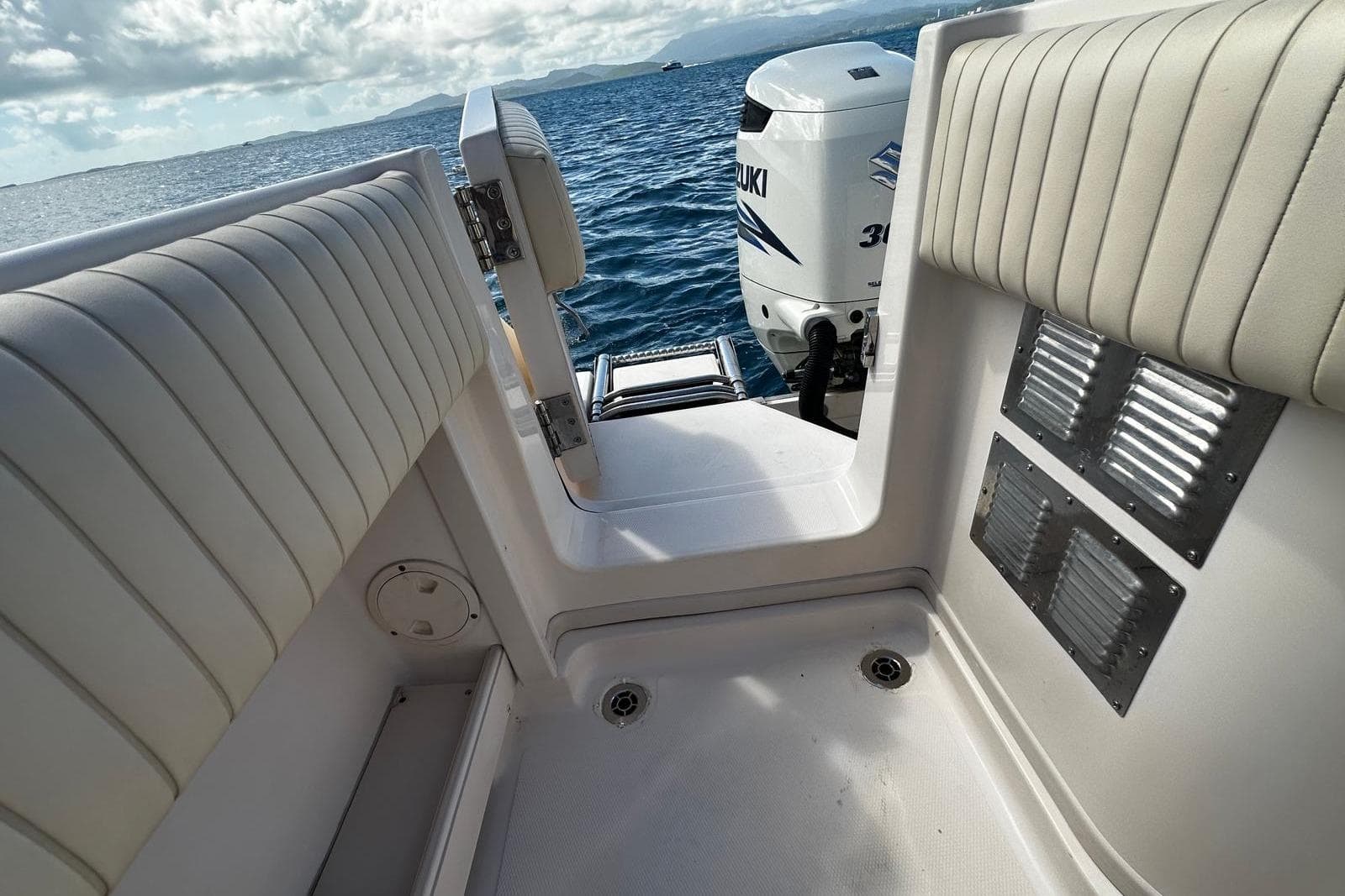 2006 Grady-White Express 360 boat interior with Suzuki engine, ocean view.