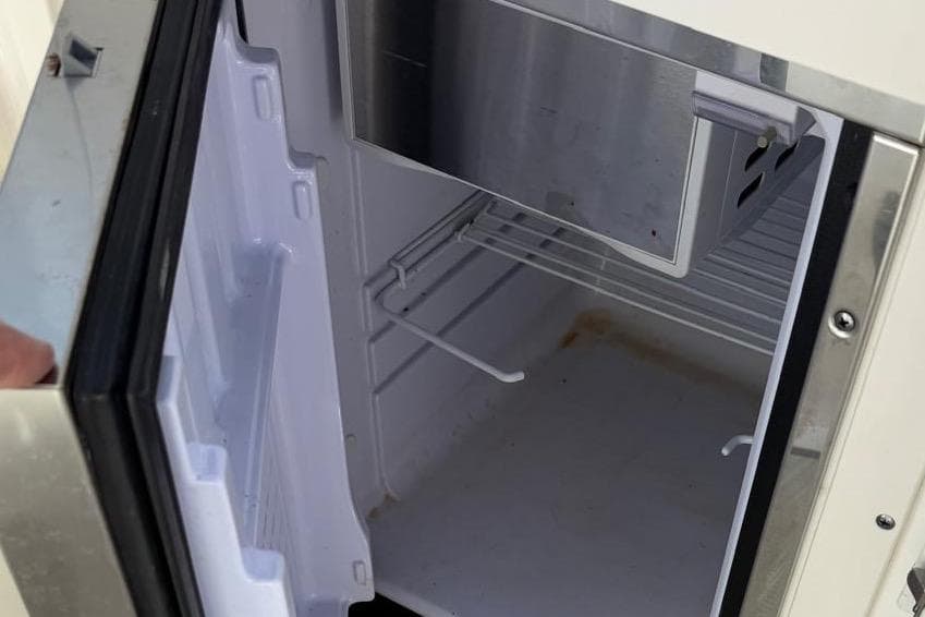 Open refrigerator in Chaparral 267 SSX boat, year 2018.
