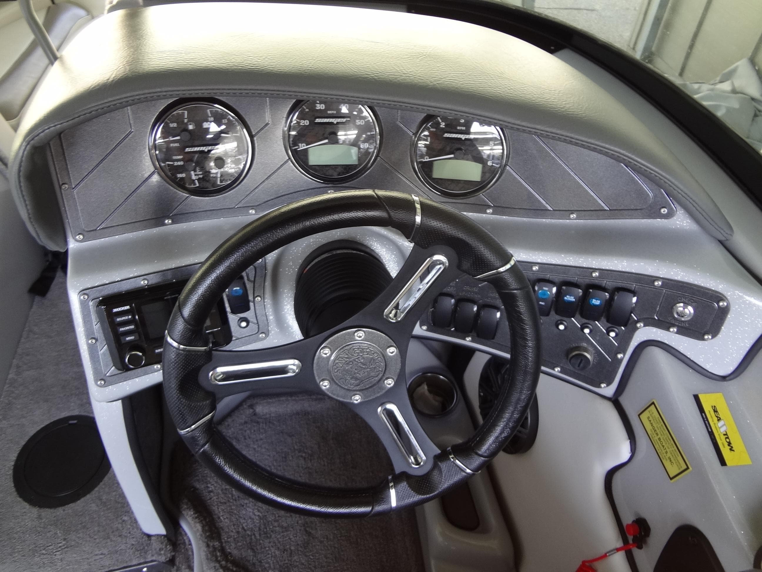2022 Sanger V237 S dashboard with steering wheel and instrument panel.