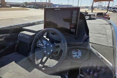 2026 Skeeter ZXE21 boat dashboard with steering wheel and electronic display.