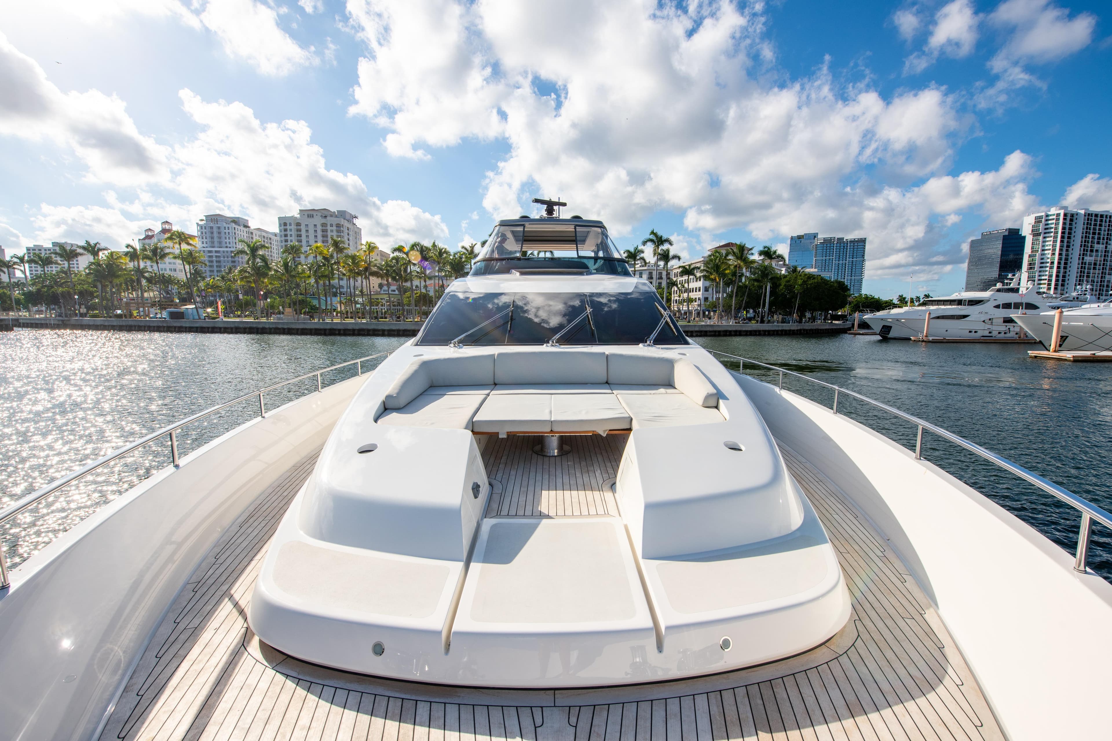 Luxurious 2016 Sanlorenzo SL86 yacht docked, featuring spacious deck and modern design.
