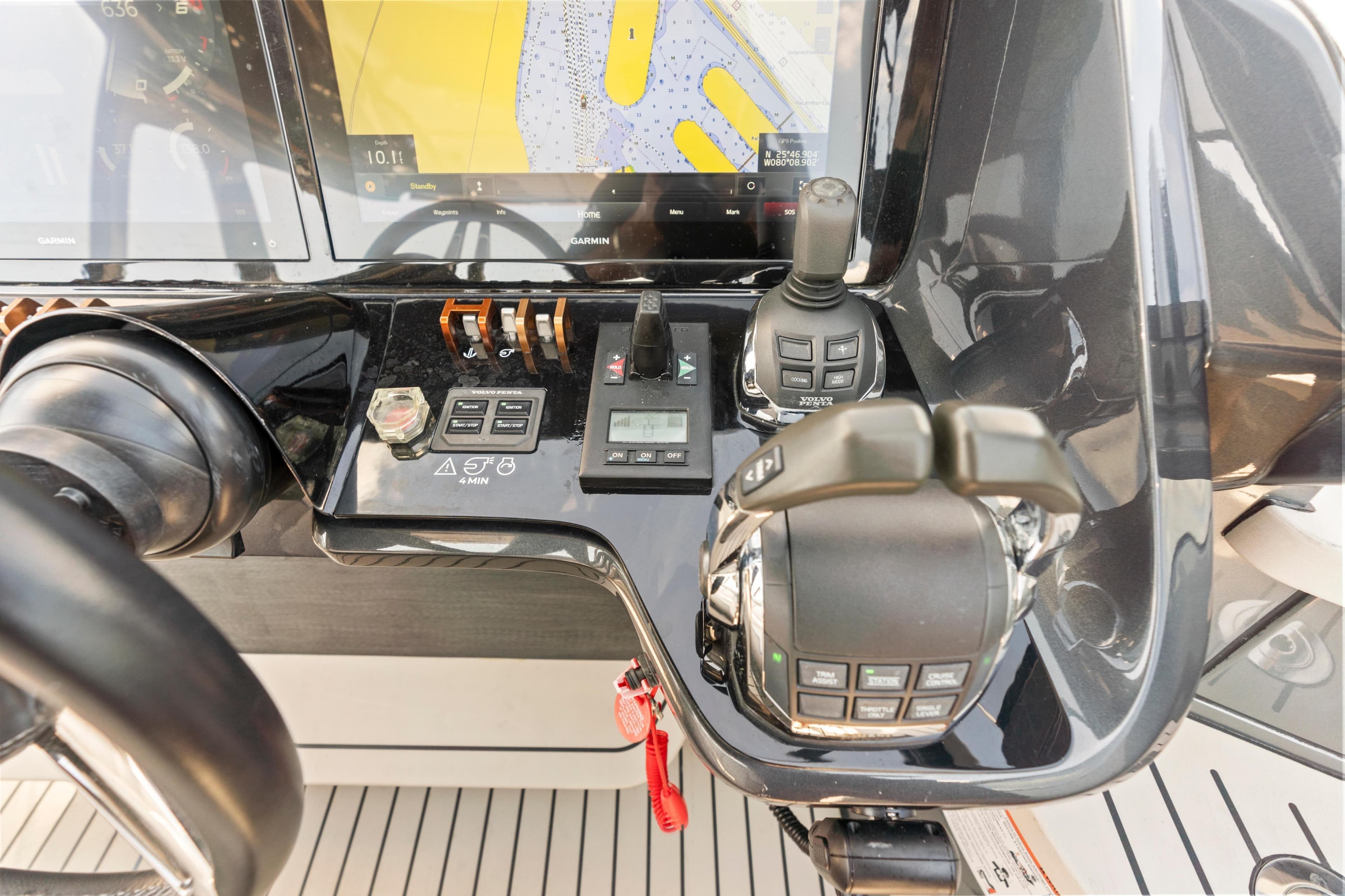 Control panel of a 2020 Princess R35 yacht with navigation display and controls.