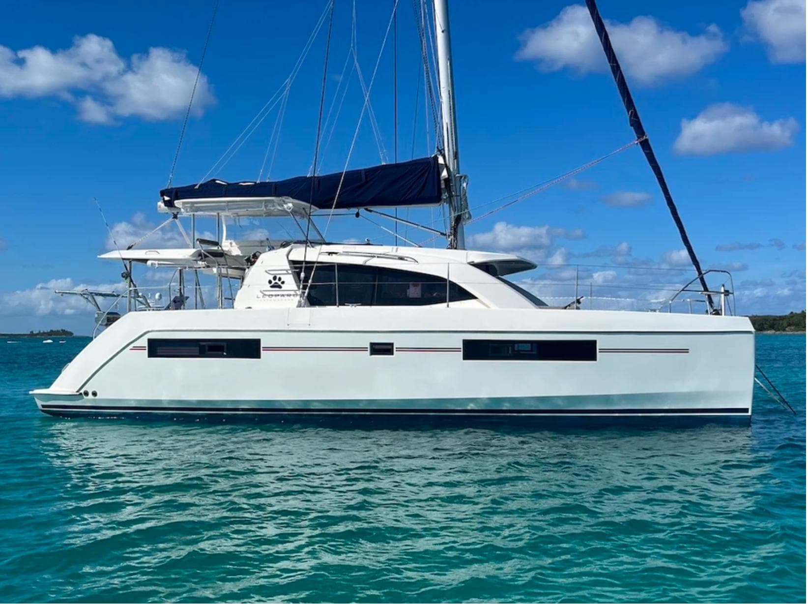 Leopard 40 catamaran 2018 on calm waters under blue sky.