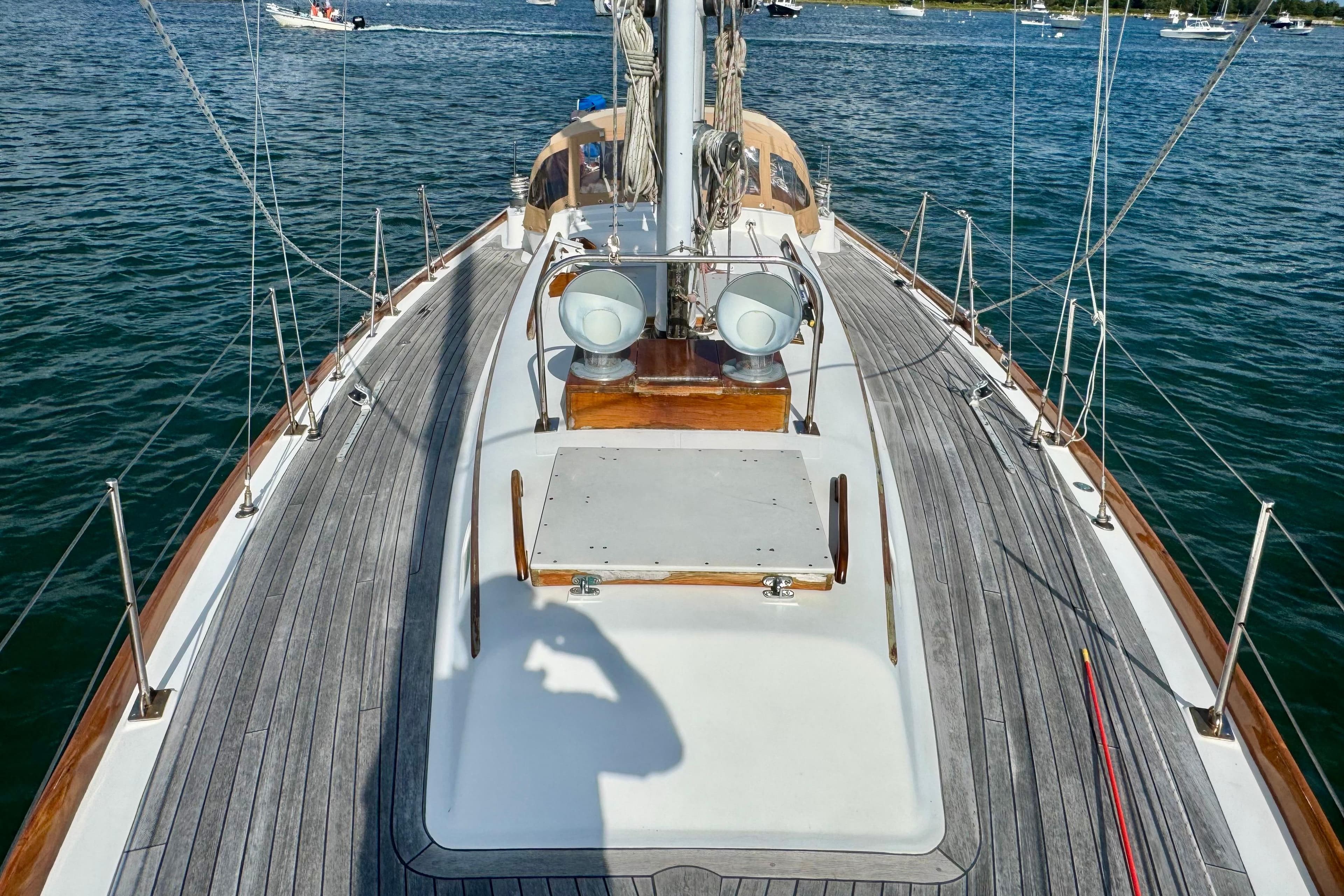Hinckley Bermuda 40 MK III sailboat deck, 1982 model, on calm waters.