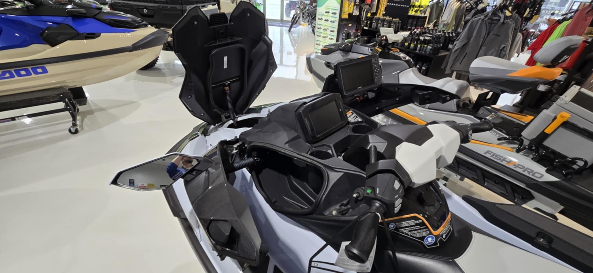 2025 Kawasaki Jetski Ultra 160 LX-S Angler in showroom, featuring advanced controls and seating.