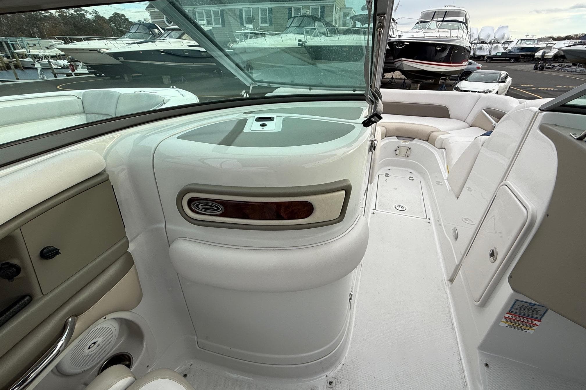 2013 Crownline Eclipse E6 boat interior with seating and storage compartments.