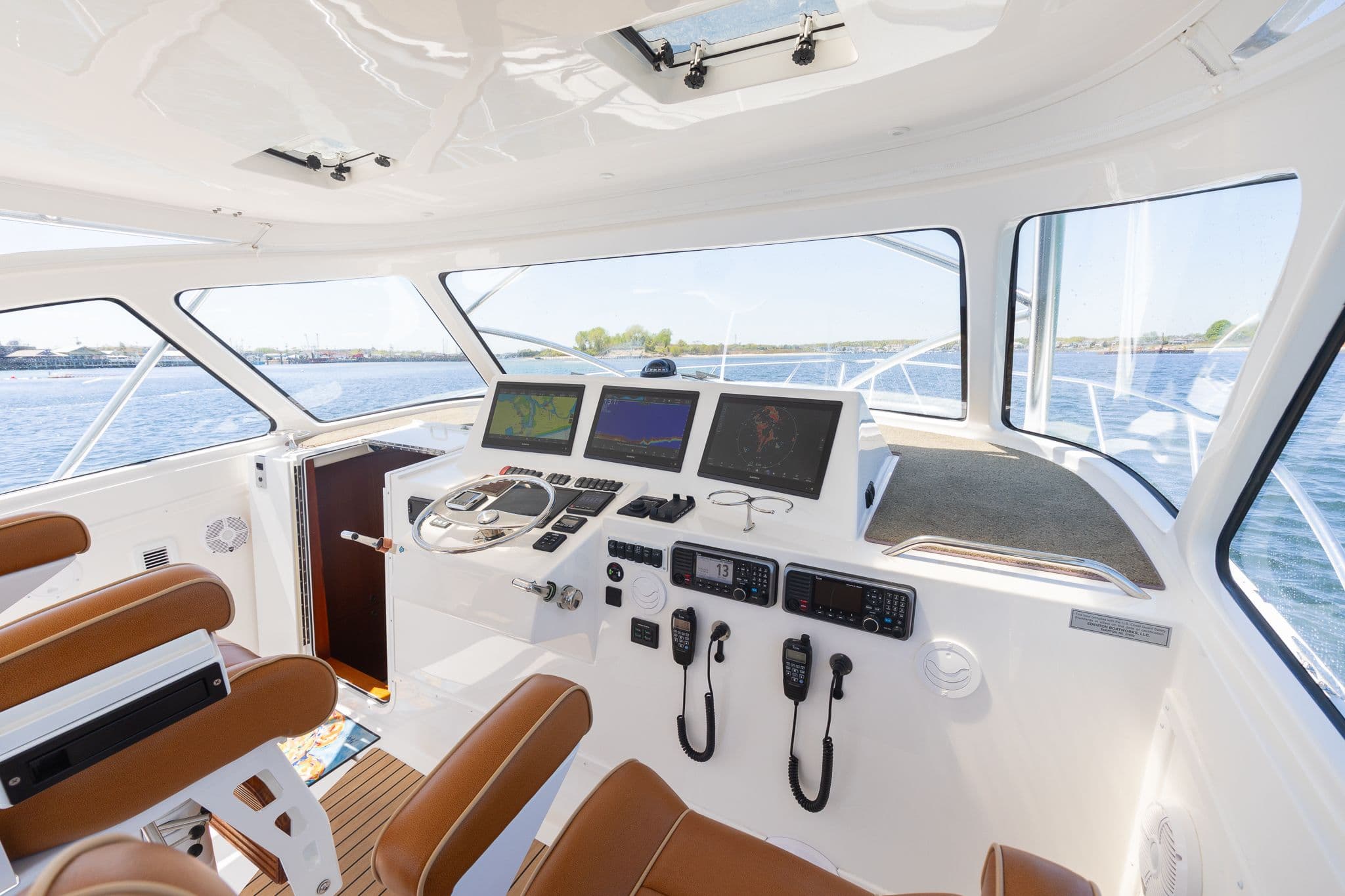 Interior of 2022 Albemarle 36 Express yacht with modern helm console.