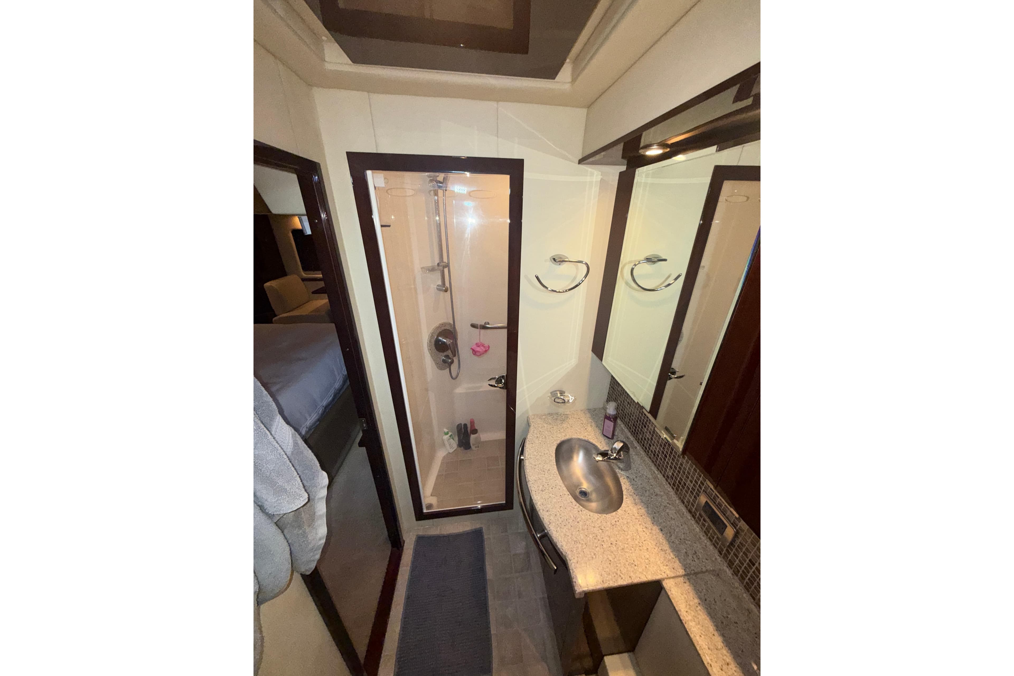 Luxurious bathroom in 2008 Sea Ray 55 Sundancer yacht with modern fixtures.