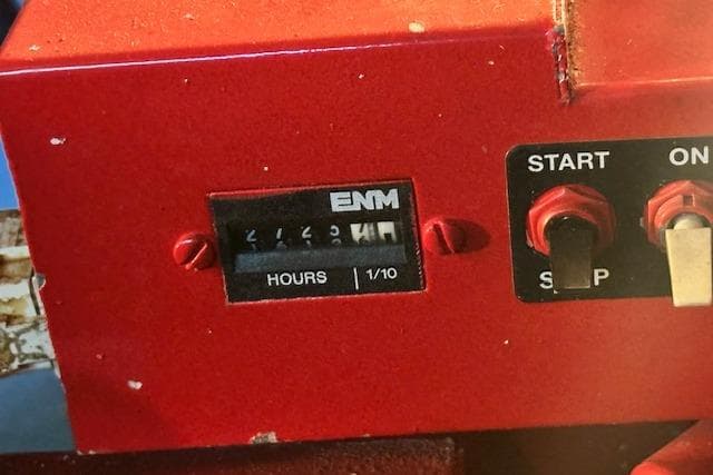 Hour meter and control switches on a 2001 Sea Ray 380 Sundancer boat.