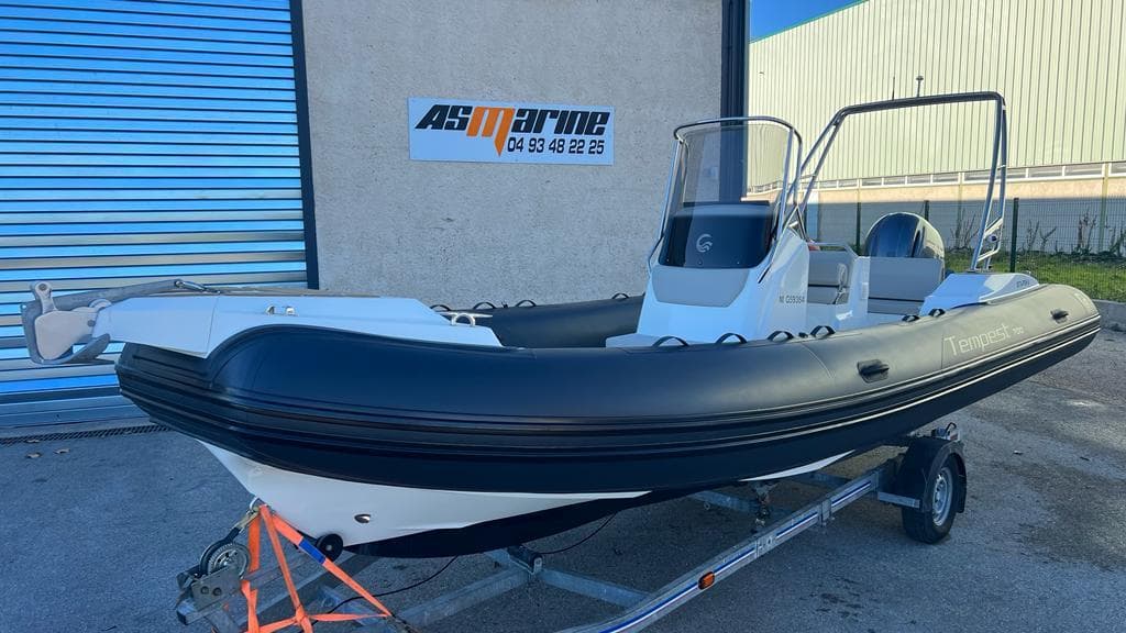 2023 Capelli Tempest 700 boat on trailer outside AS Marine facility.