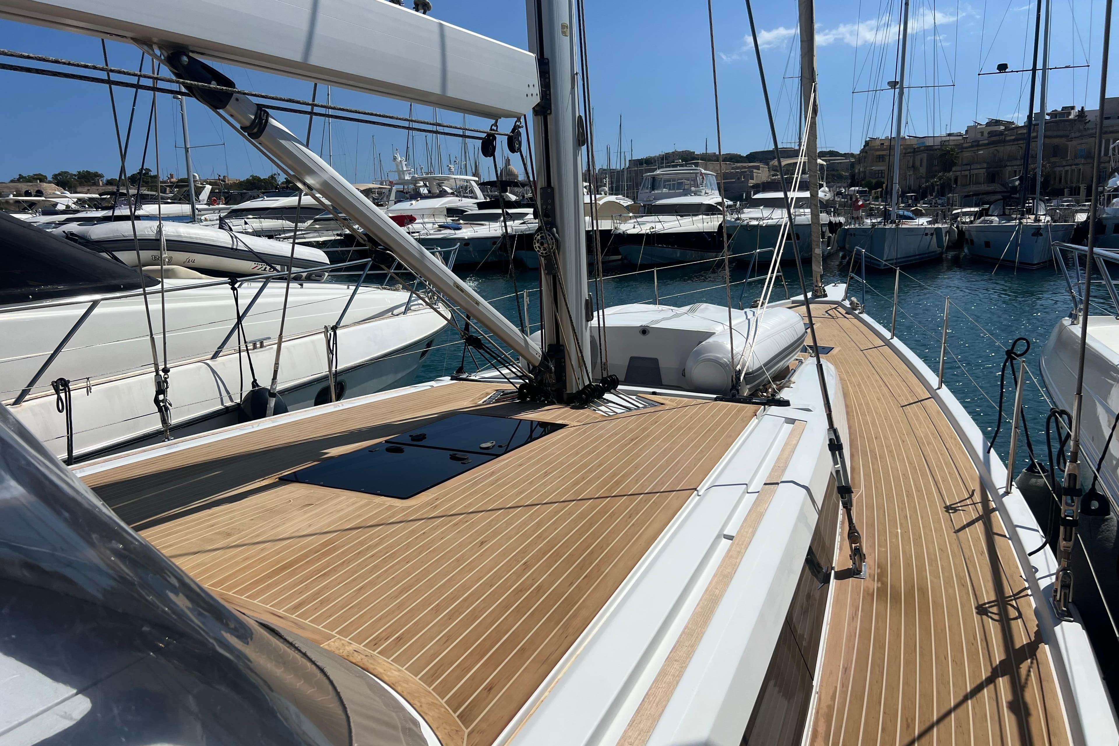 Grand Soleil 52LC 2017 yacht docked in marina, showcasing sleek deck design.