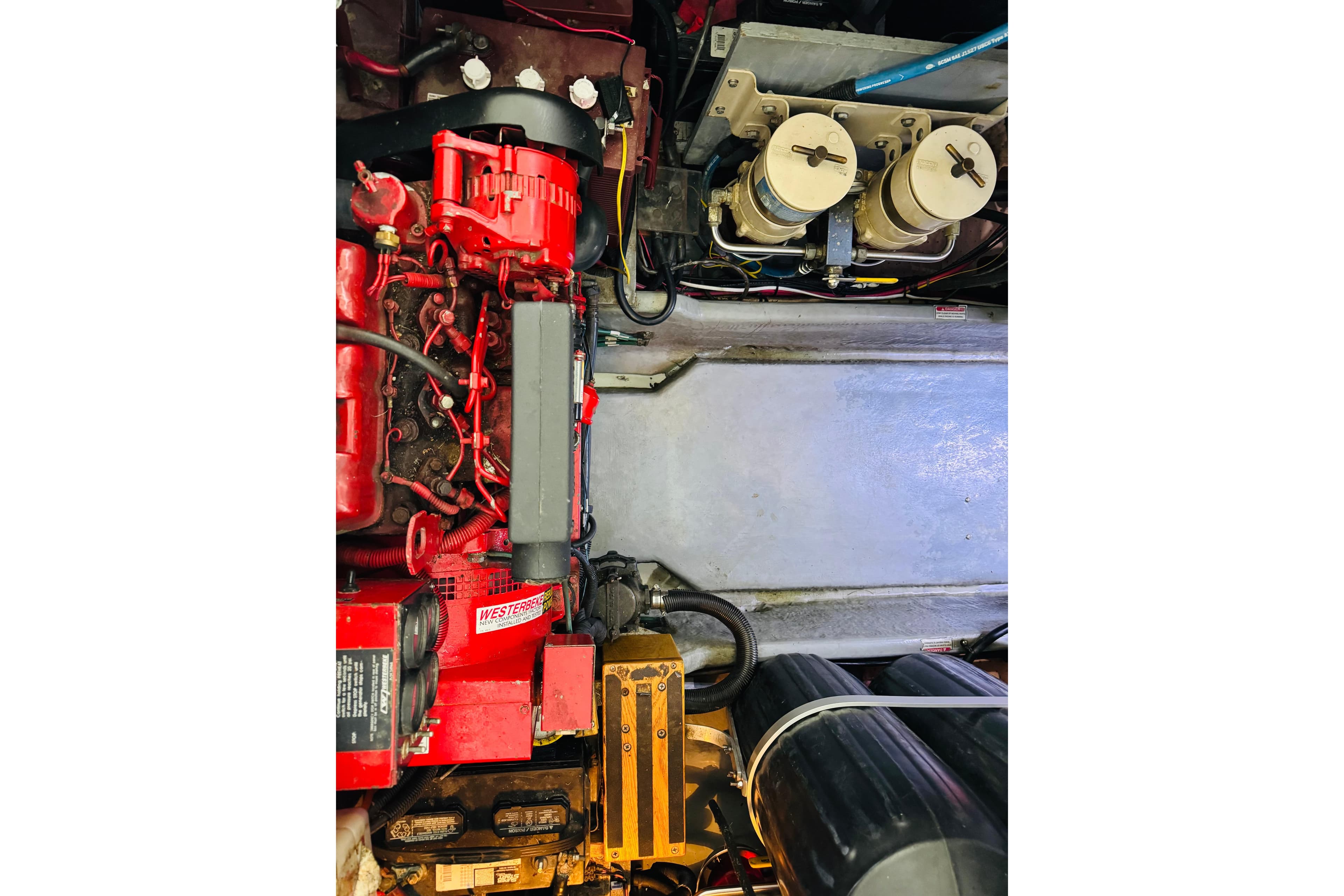 Engine compartment of a 1999 Sea Ray 400 Sedan Bridge with visible components.