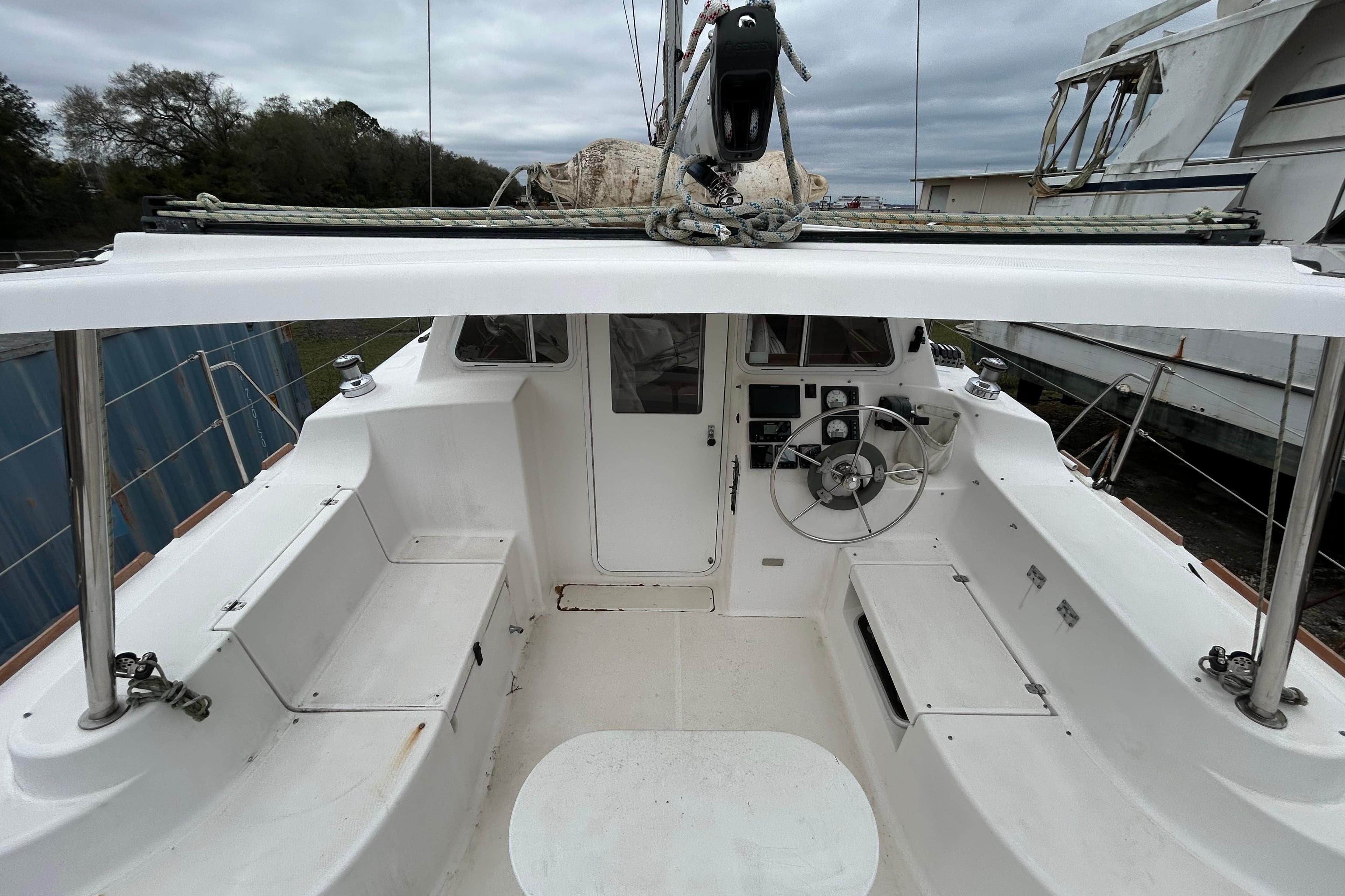 Cockpit of 2013 Gemini Legacy 35 sailboat with steering wheel and seating.
