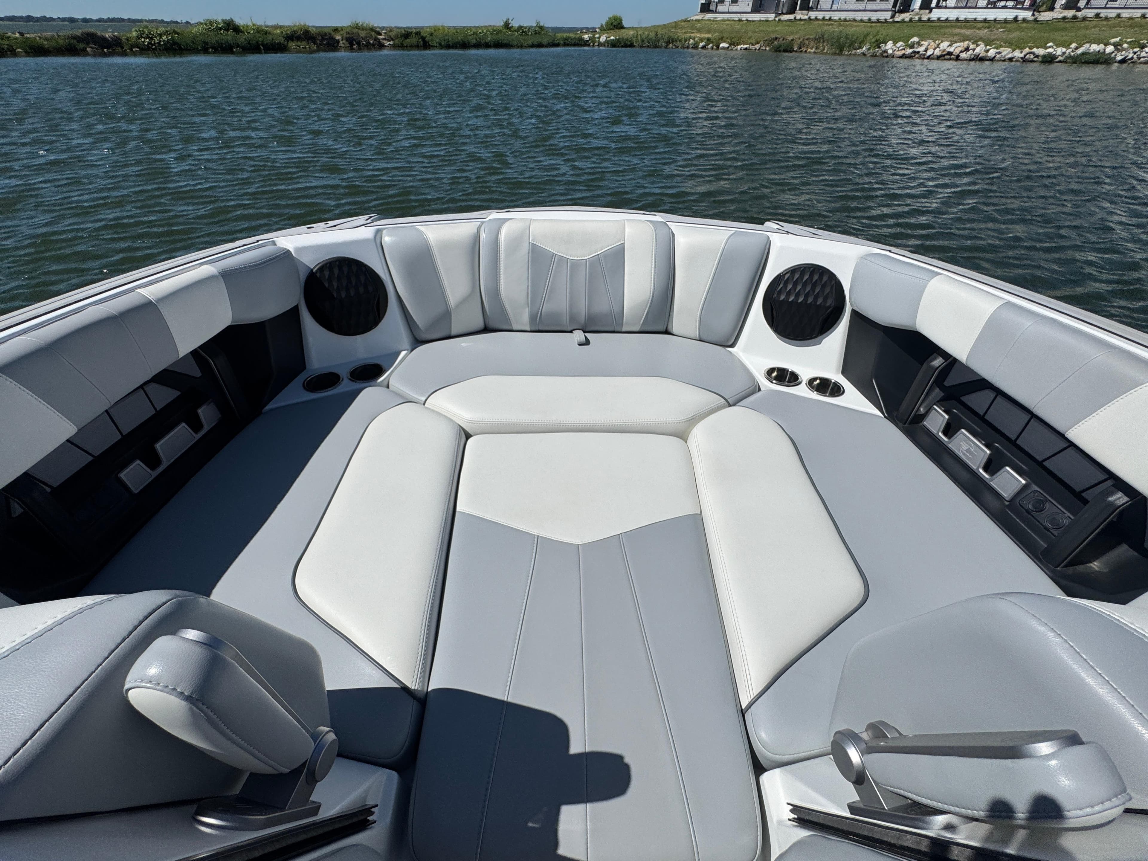 2022 Malibu Wakesetter 24 MXZ boat interior with gray and white seating.