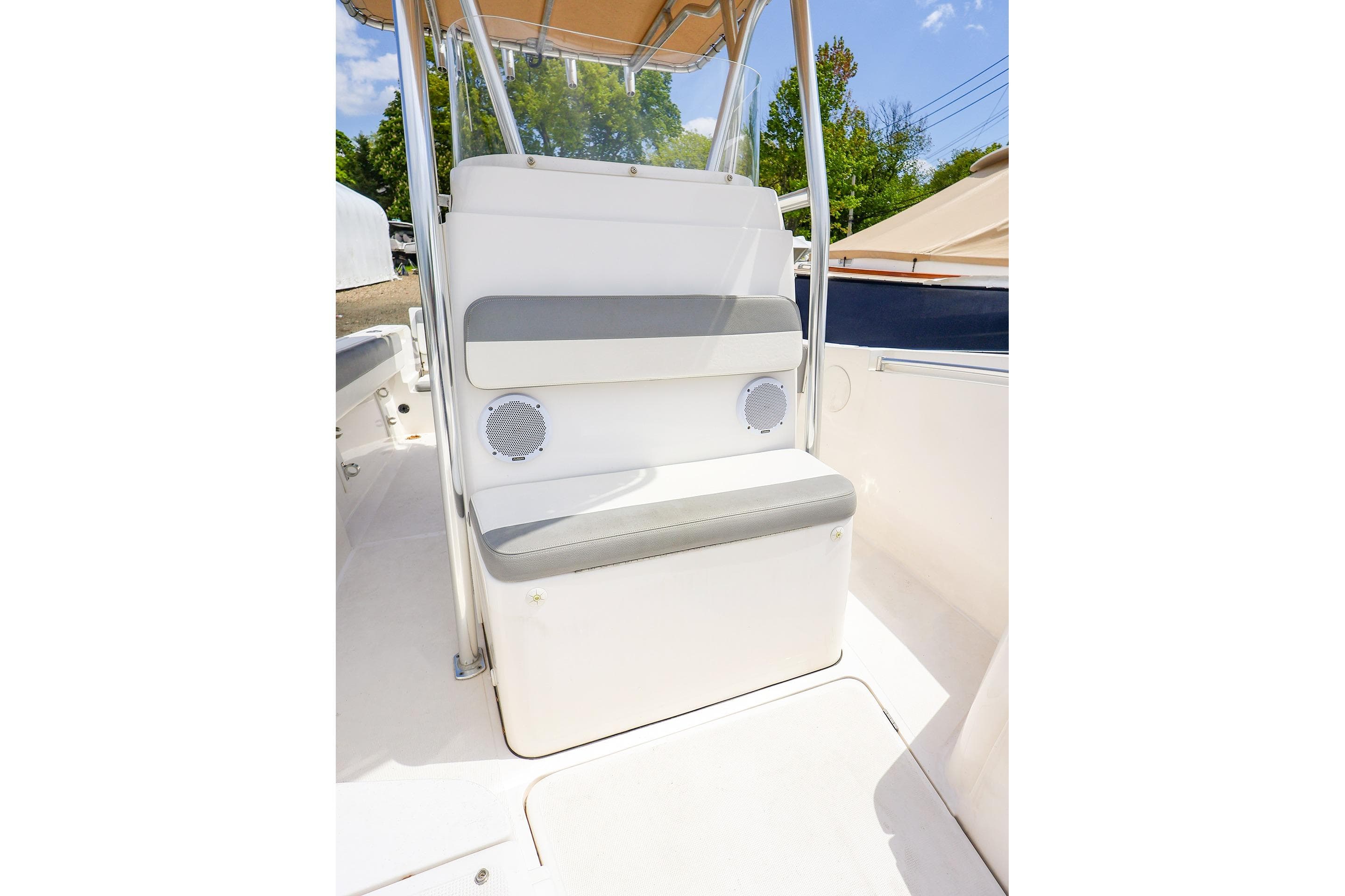 2016 Release 208 RX boat interior with cushioned seating and speaker system.