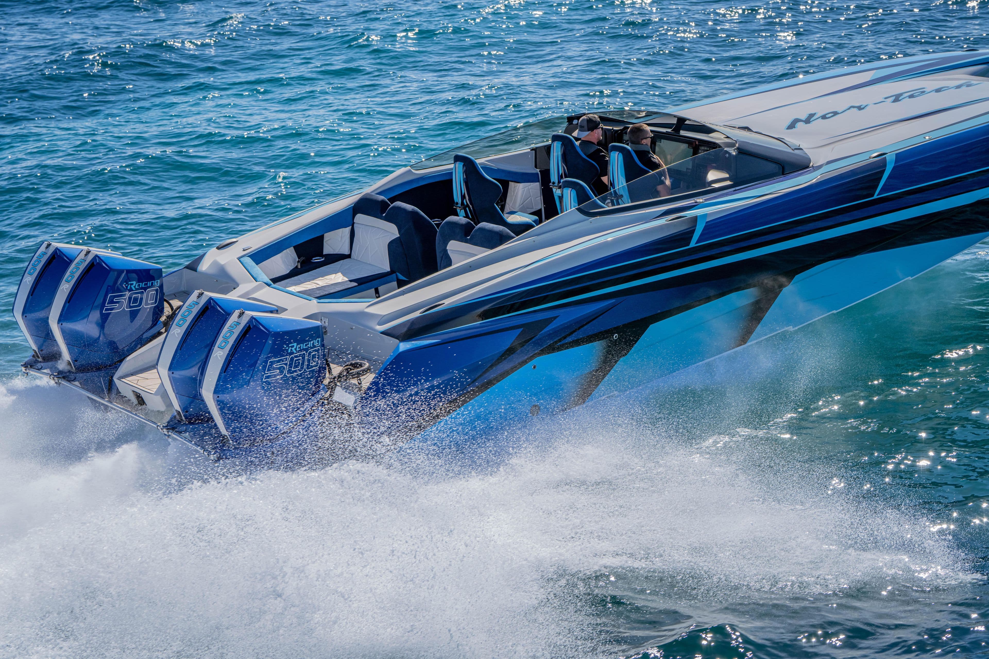 2026 Nor-Tech 4000 Super Catamaran speeding on ocean waters, showcasing powerful engines.
