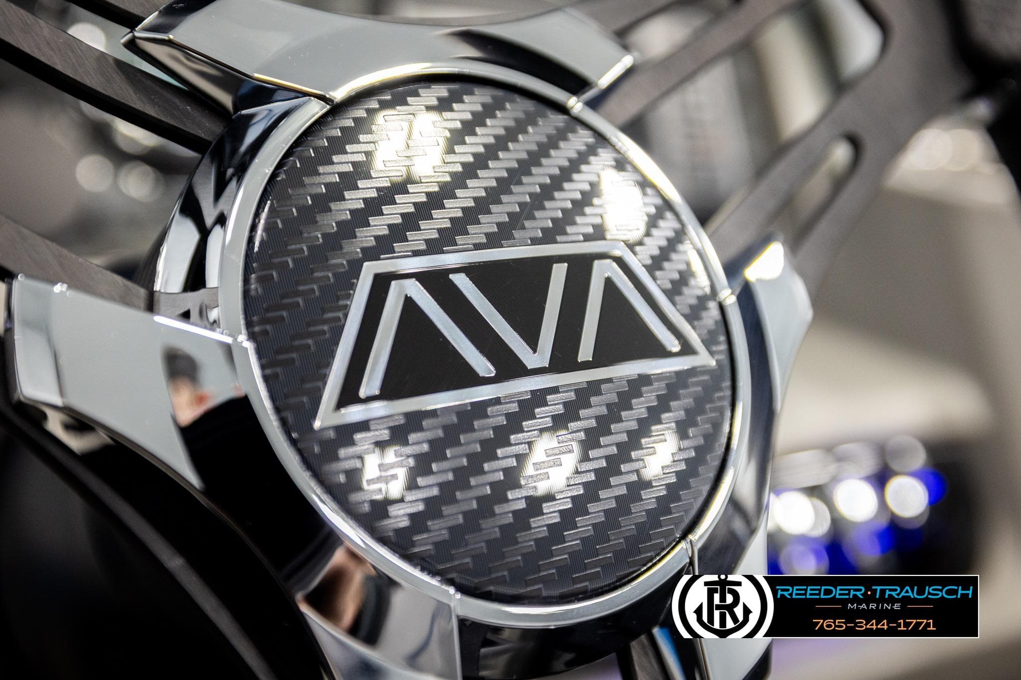 Close-up of 2026 Avalon LSZ Vrl steering wheel with carbon fiber design.