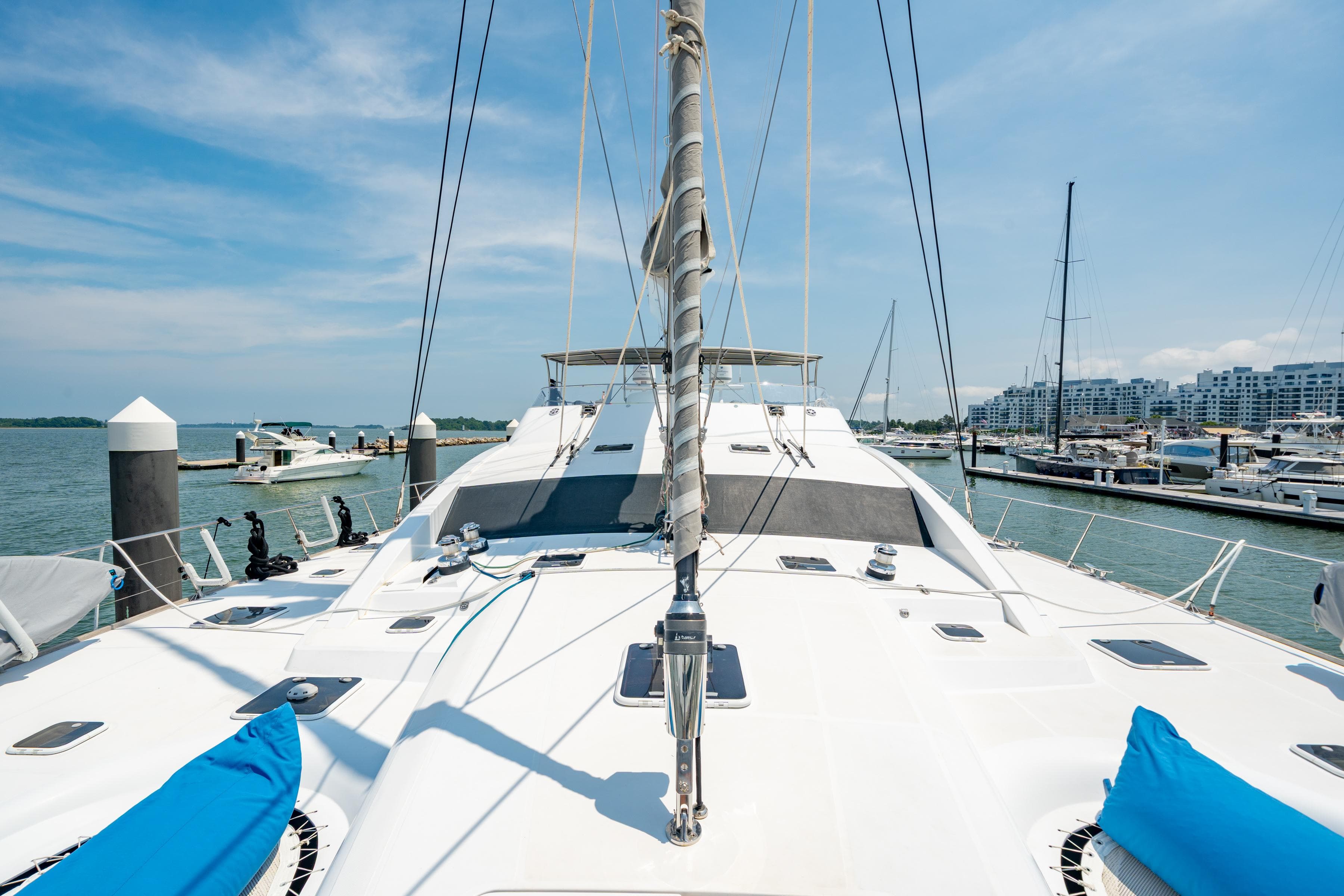 Luxury Privilege 745 yacht docked at marina, clear sky, 2008 model.