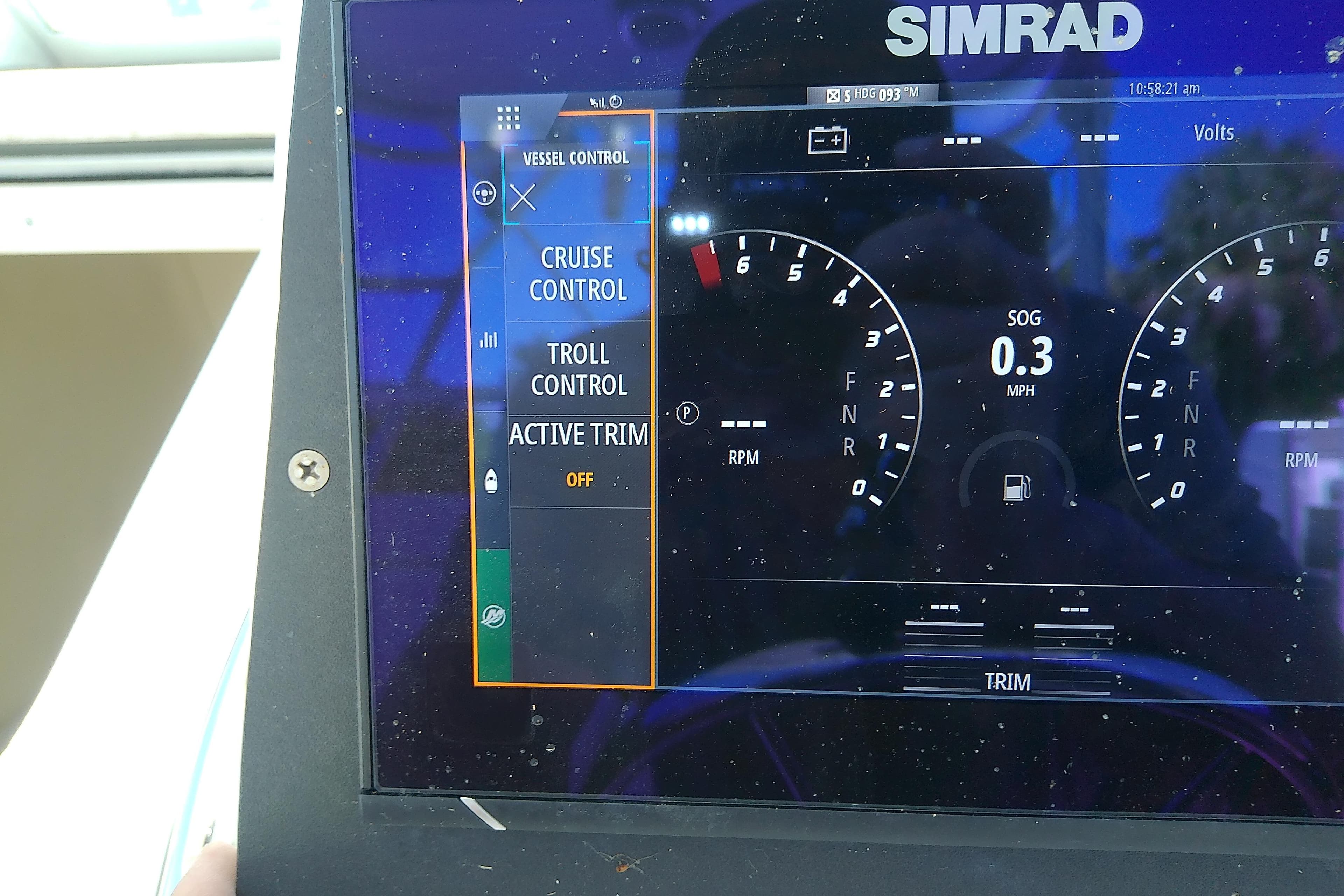 Simrad display on 2001 Boston Whaler 28 Outrage showing vessel control options.
