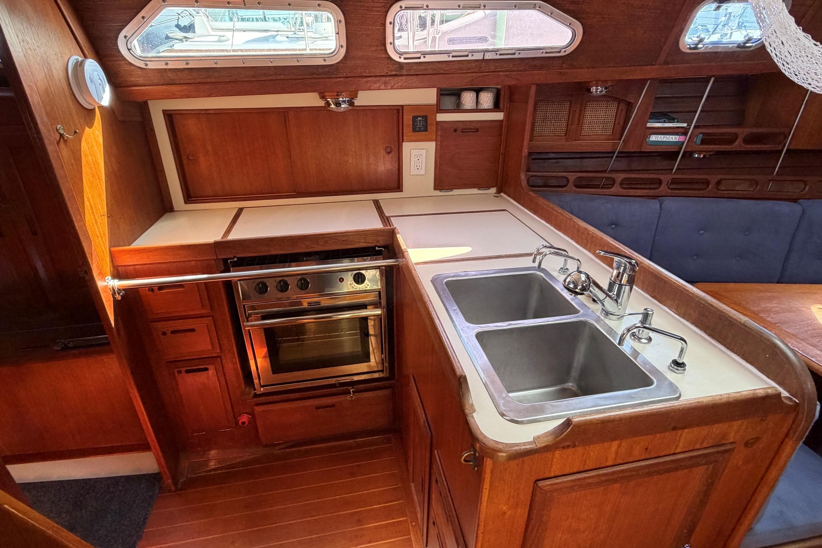 1989 Ericson 38-200 Masthead Sloop galley with dual sinks and stove.