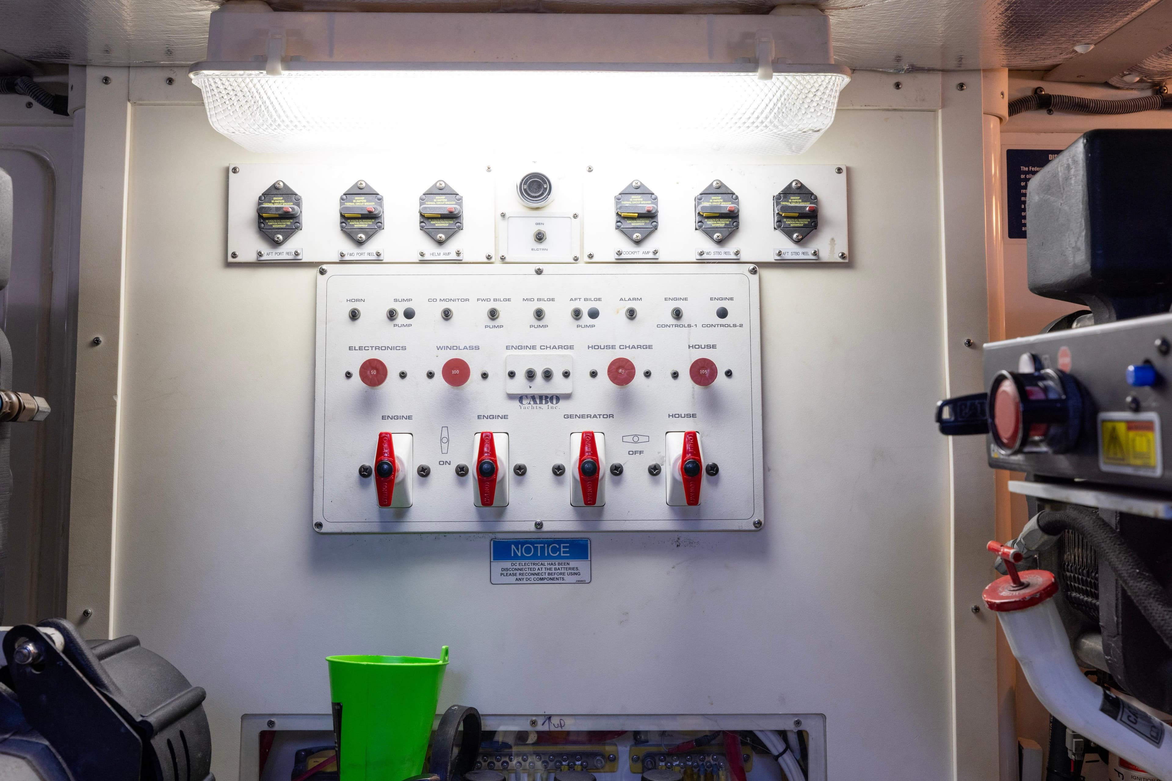 Electrical control panel inside 2012 Cabo 44 Hardtop Express boat engine room.