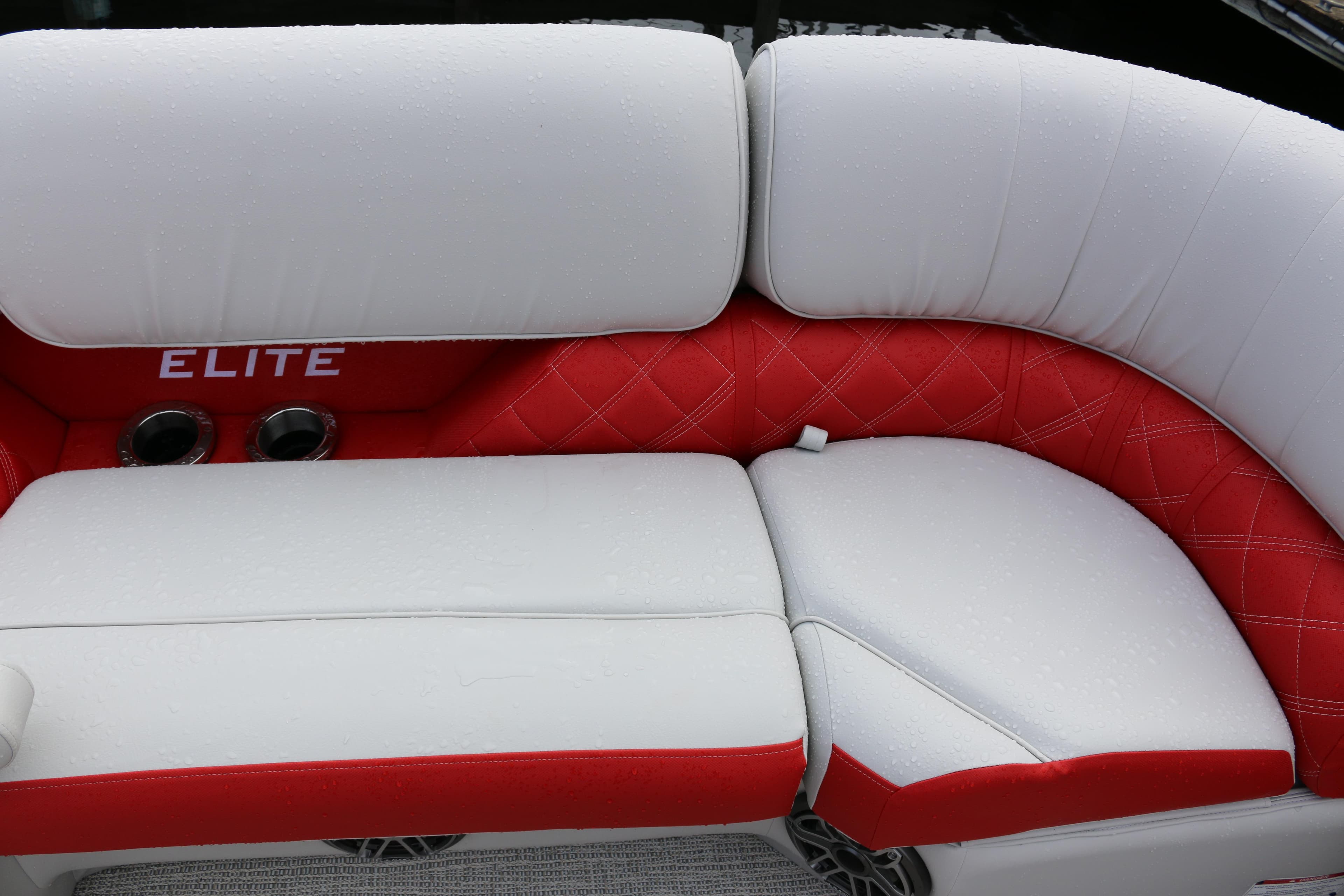 Luxurious white and red seating on 2025 SunCatcher Elite 324 RC boat.