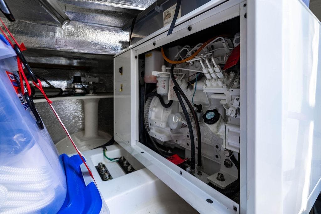 Engine compartment of a 2022 Leopard 53 Powercat, showcasing mechanical components and wiring.