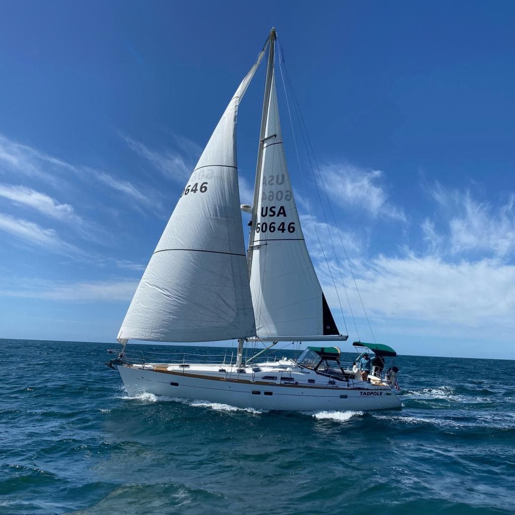 2005 Beneteau Oceanis Clipper 423 sailboat on open sea.