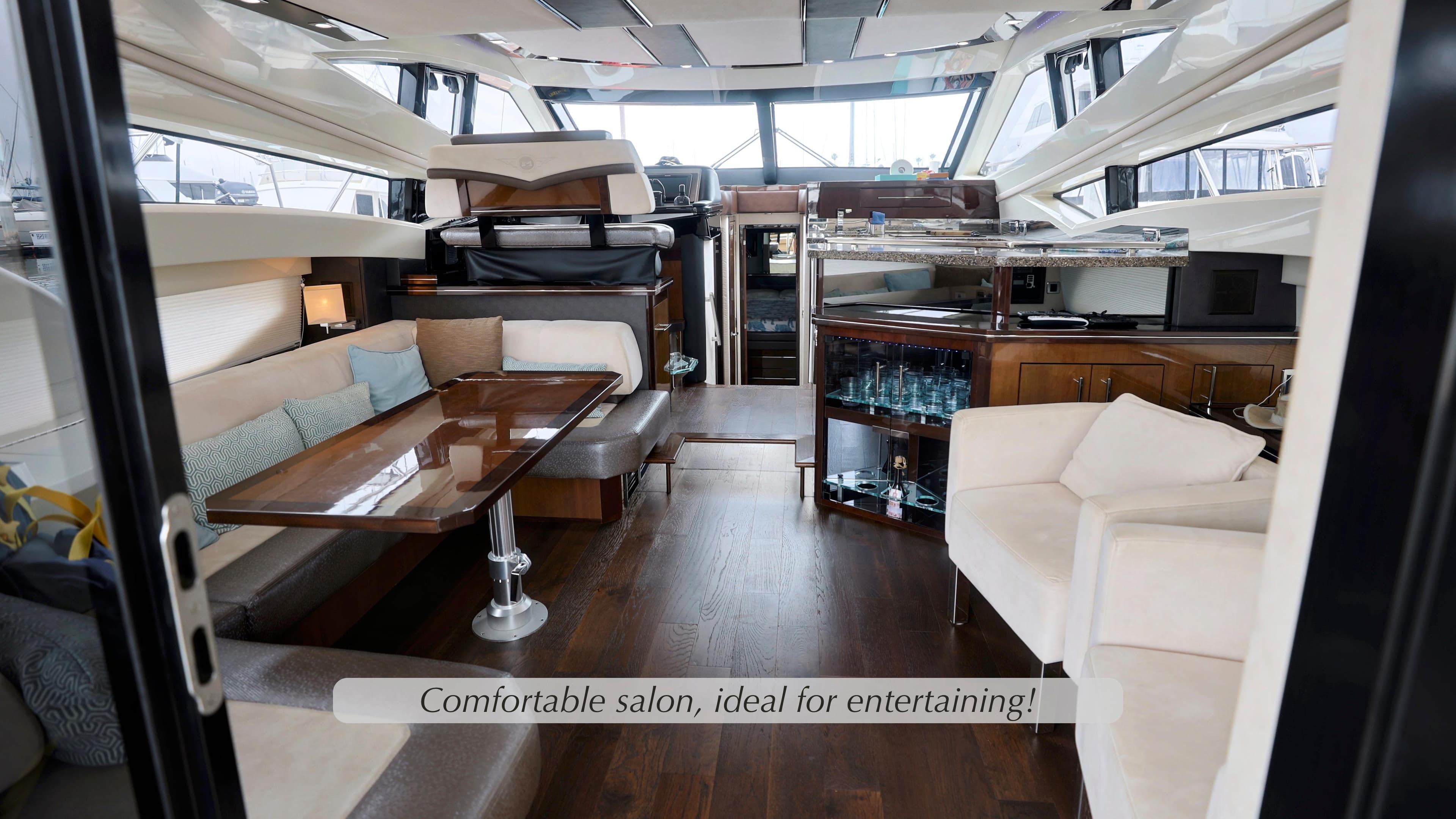 2013 Marquis 500 Sport Bridge yacht interior with elegant salon and entertainment area.