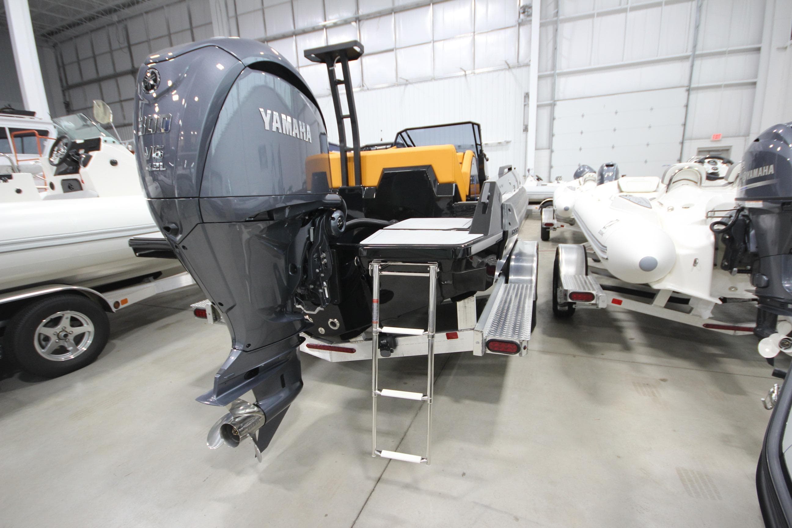 2026 Iron 767 T-top boat with Yamaha engine in showroom.