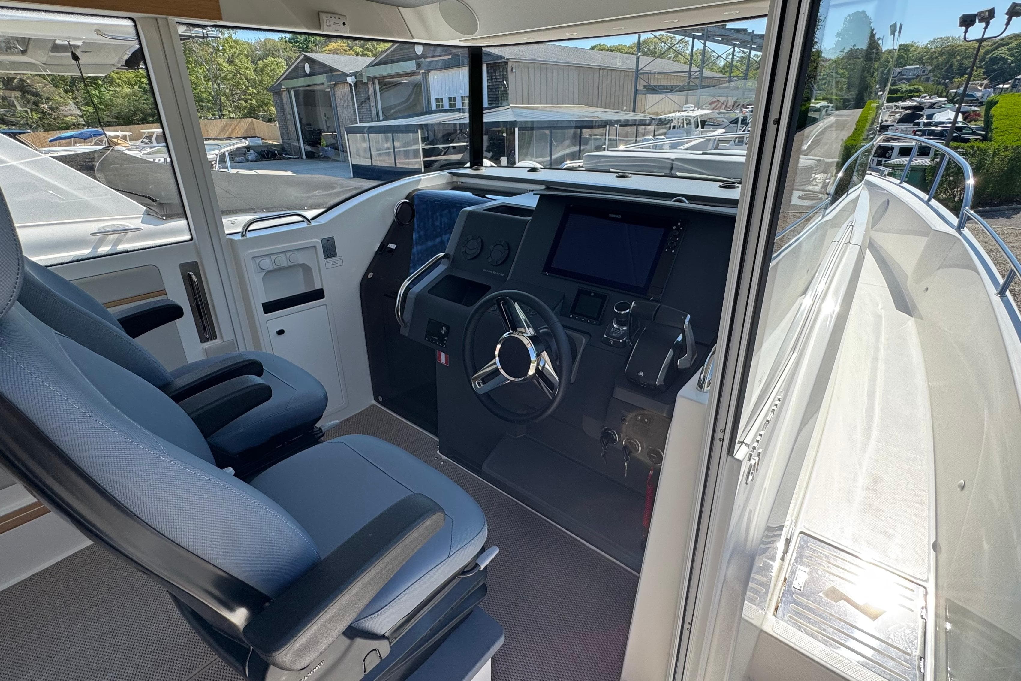Interior of Nimbus Commuter 11 boat, model year 2025.