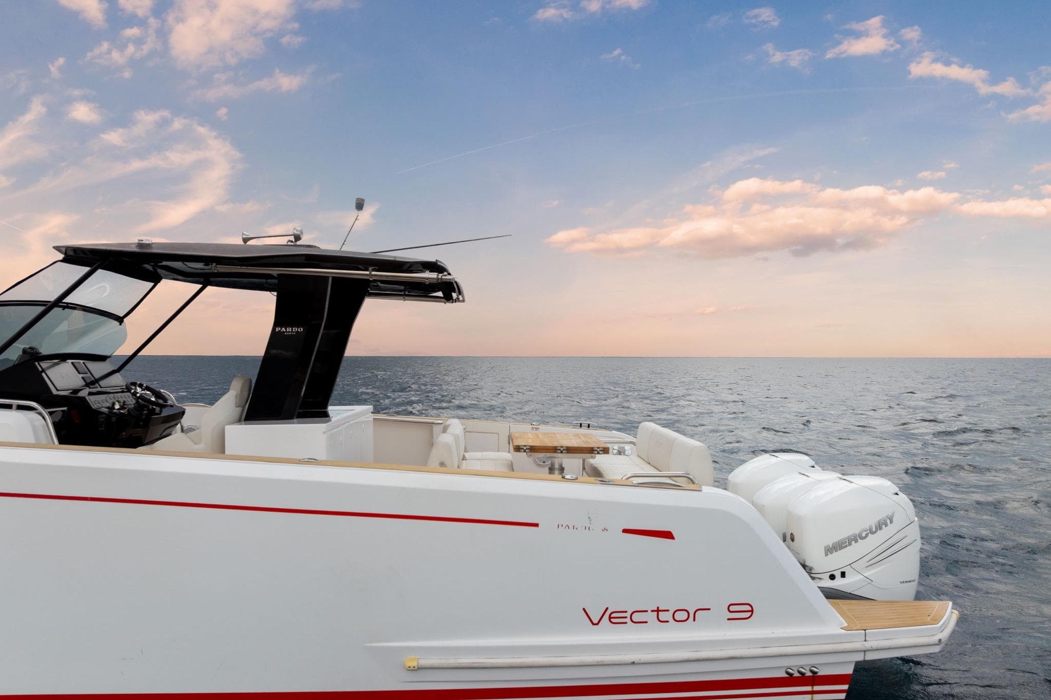 Pardo Yachts 38, 2021 model, cruising on open sea under a vibrant sky.