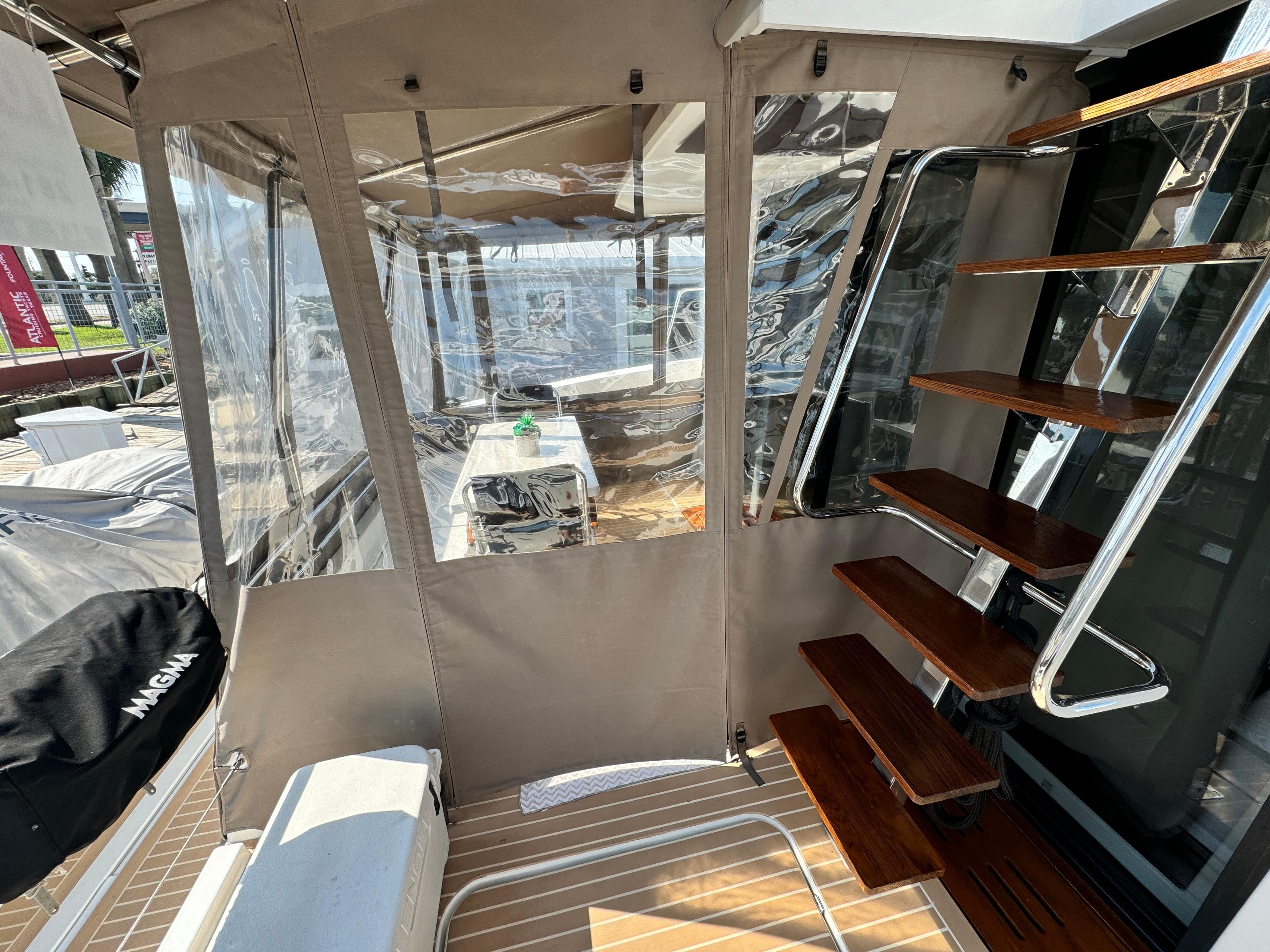 Fountaine Pajot MY 37 yacht interior with wooden stairs and seating area, 2017 model.
