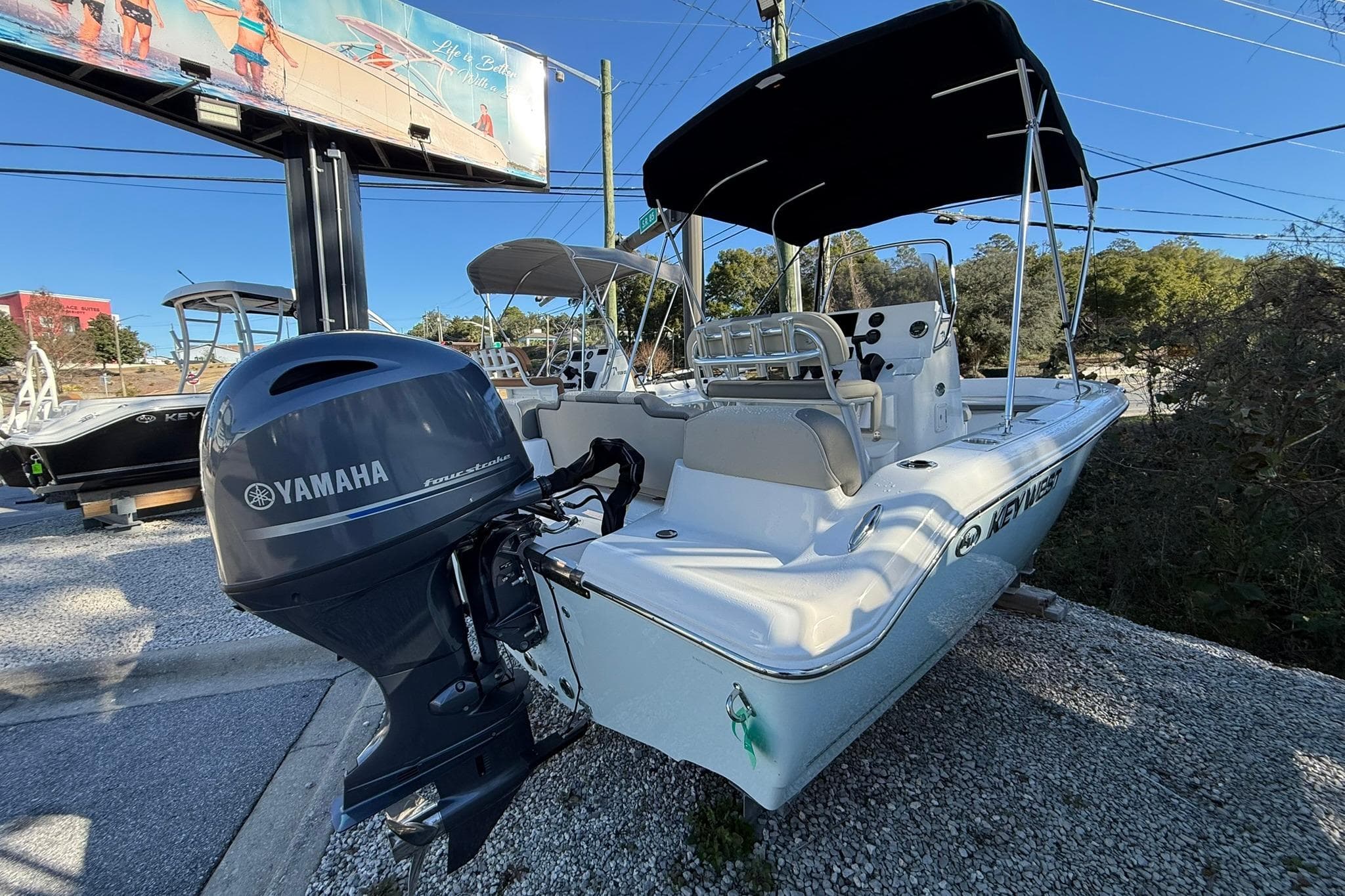 2026 Key West 189 FS boat with Yamaha outboard motor, parked outdoors.