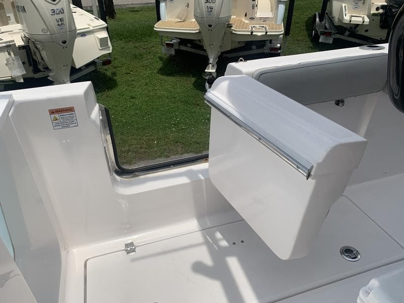 2023 Sea Fox 268 Commander boat interior with seating and storage features.