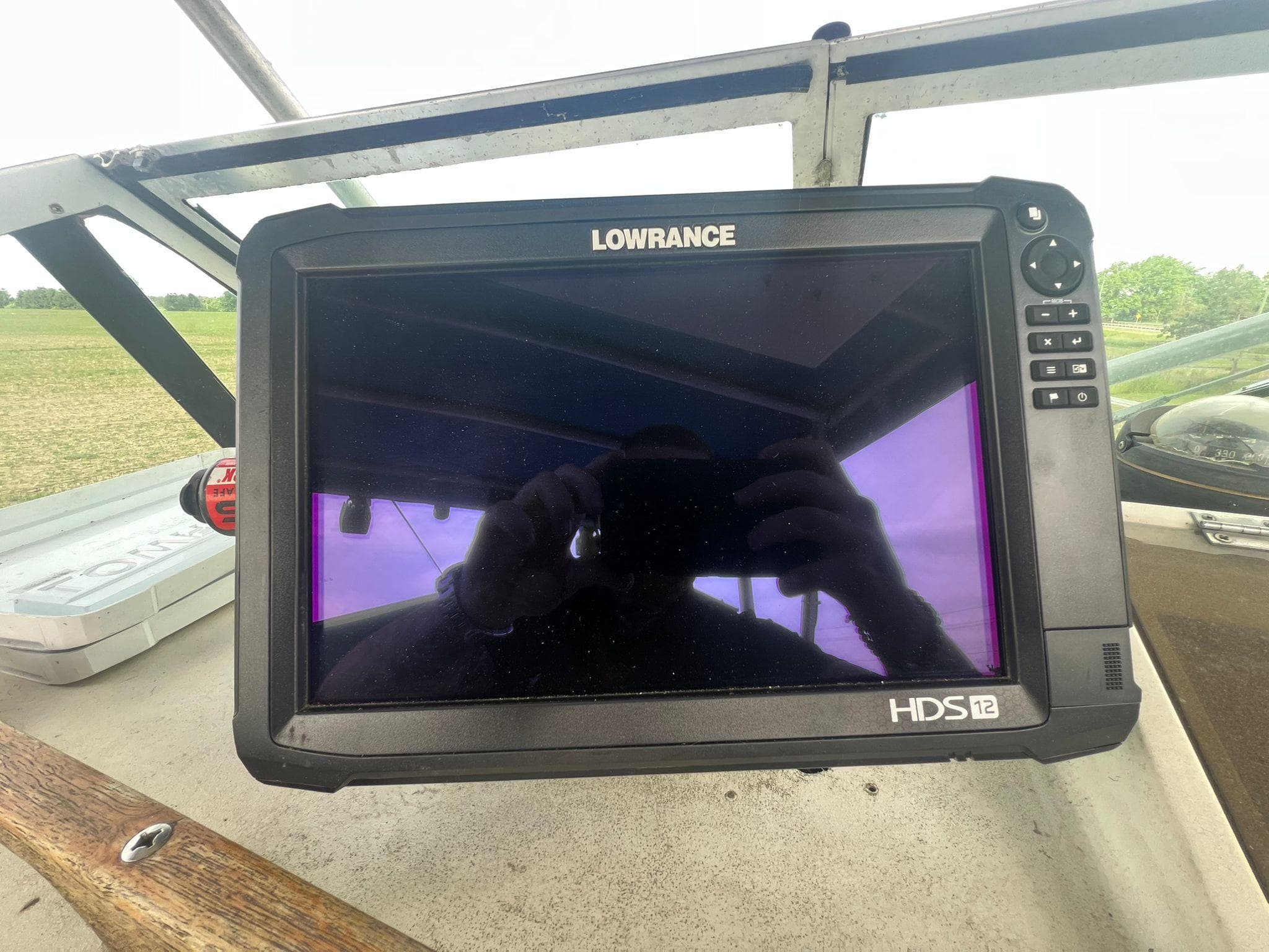 Lowrance HDS-12 fishfinder on 1988 Grady-White Offshore 240 boat dashboard.