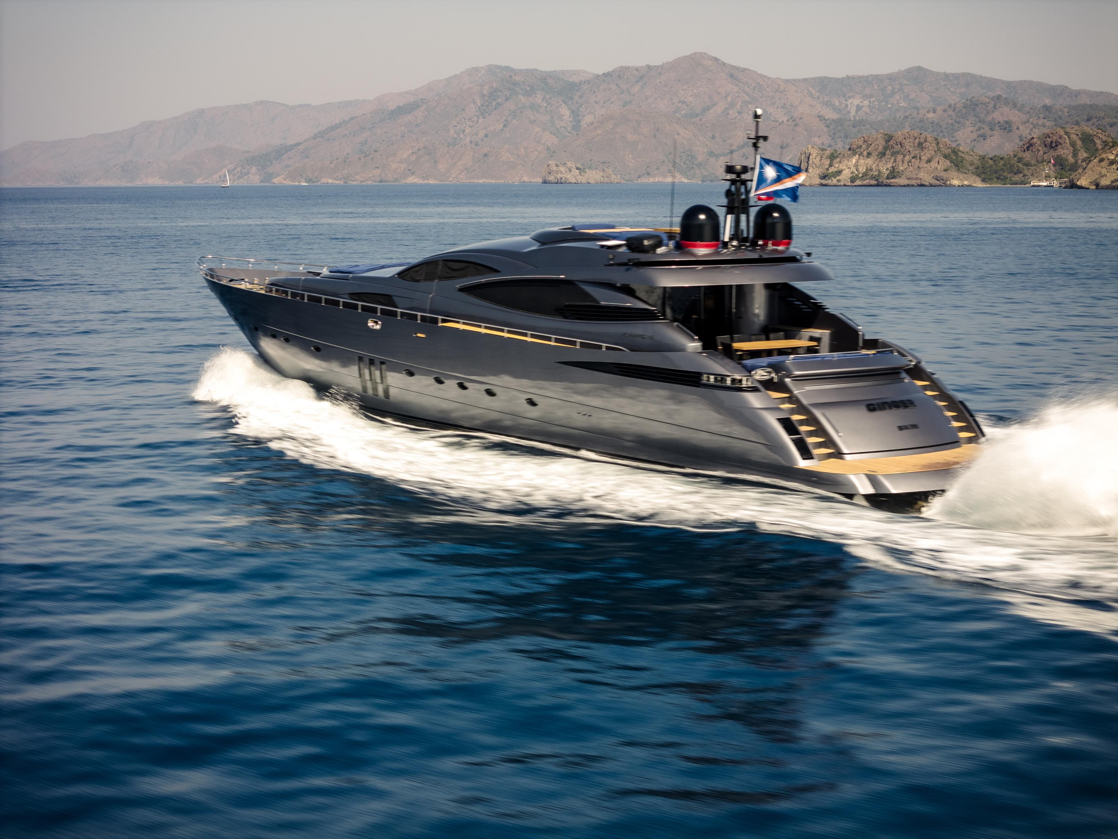 Luxury Pershing 115 yacht cruising on open water, 2006 model.