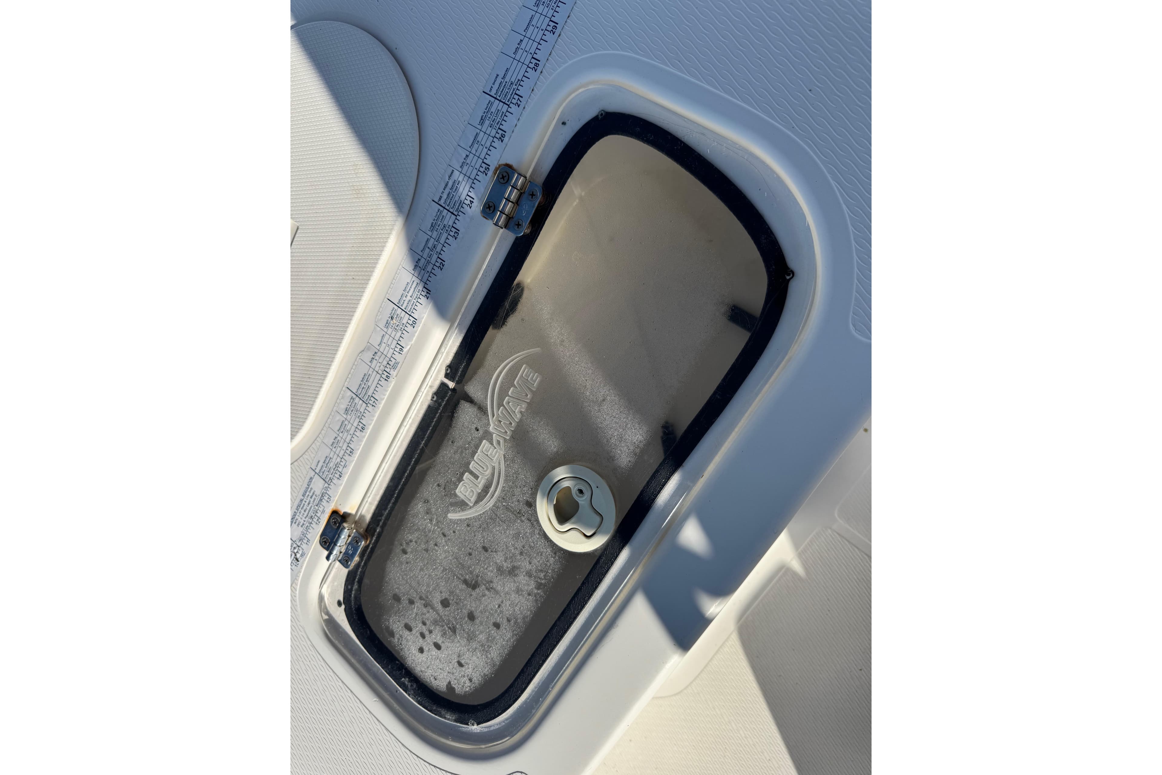 2016 Blue Wave 2200 STL RISER boat compartment with measurement markings.