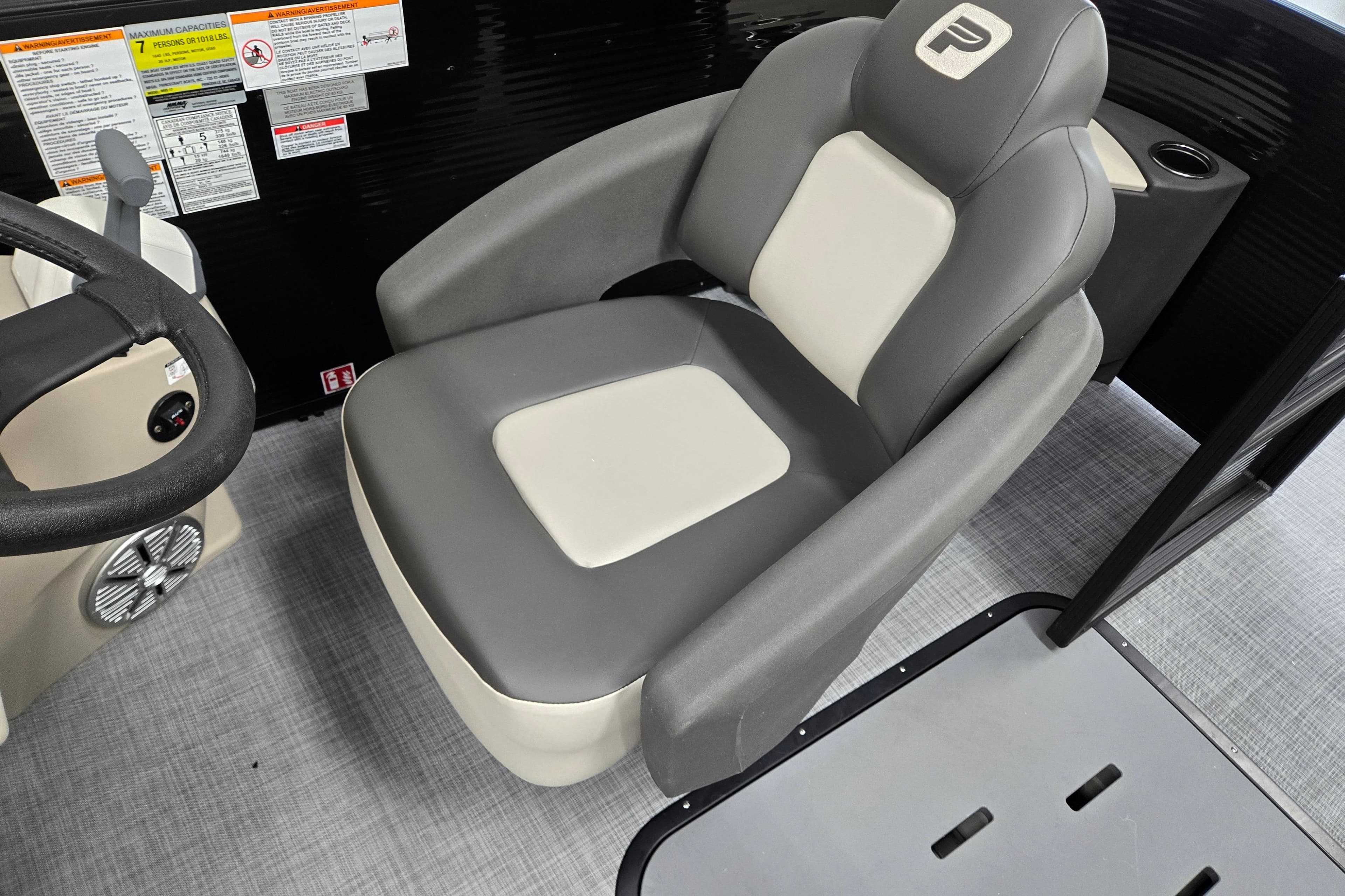 Captain's seat in 2026 Princecraft Brio 17 Electric boat, featuring ergonomic design and modern controls.