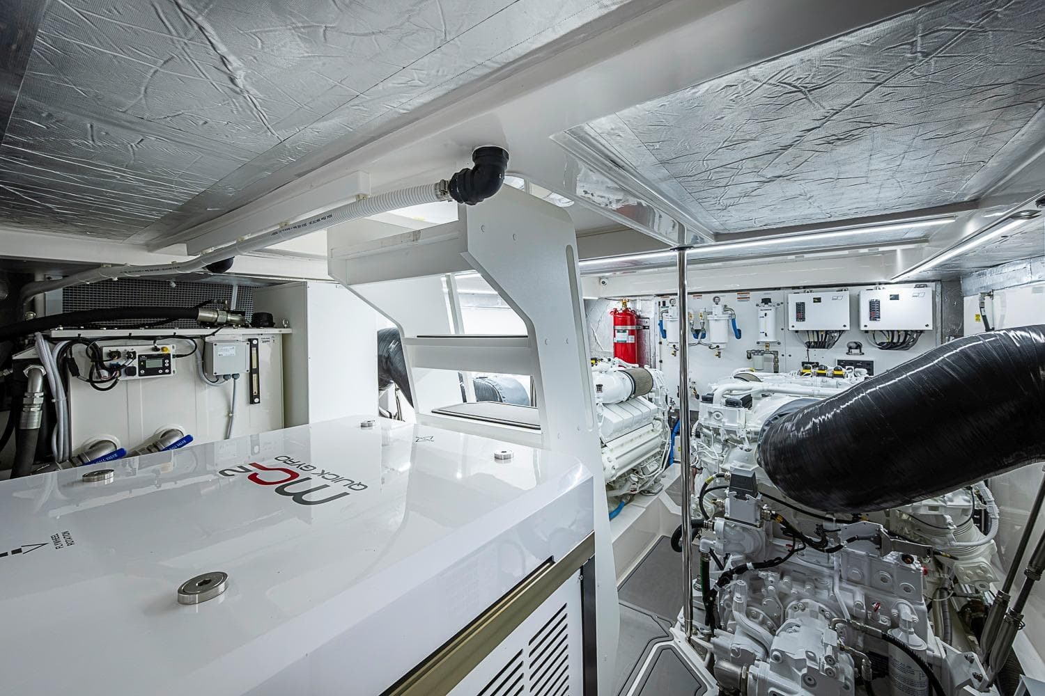 Engine room of 2025 Maritimo M75 yacht, showcasing advanced machinery and equipment.