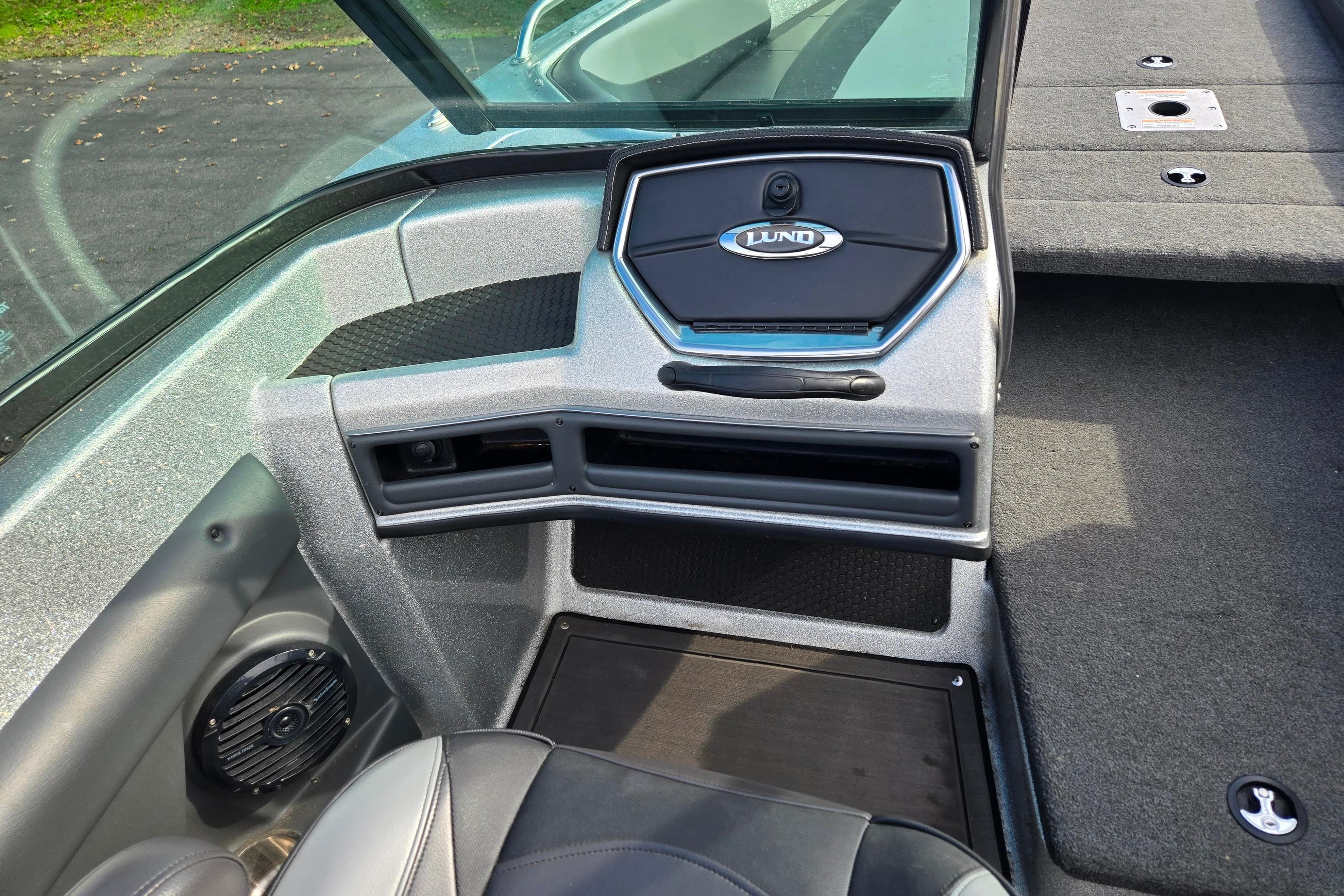 2020 Lund 189 Tyee GL boat interior with dashboard and seating area.