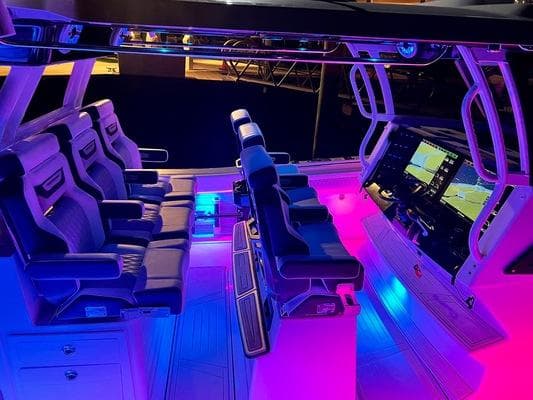2024 Blackfin 400CC boat interior with illuminated seating and advanced navigation displays.