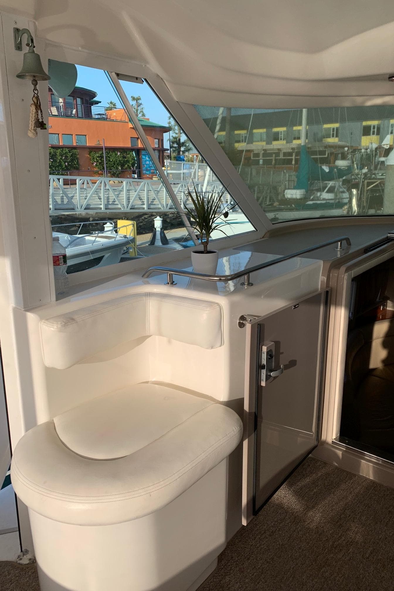 Interior of a 2004 Sea Ray 390 Motor Yacht with seating area.