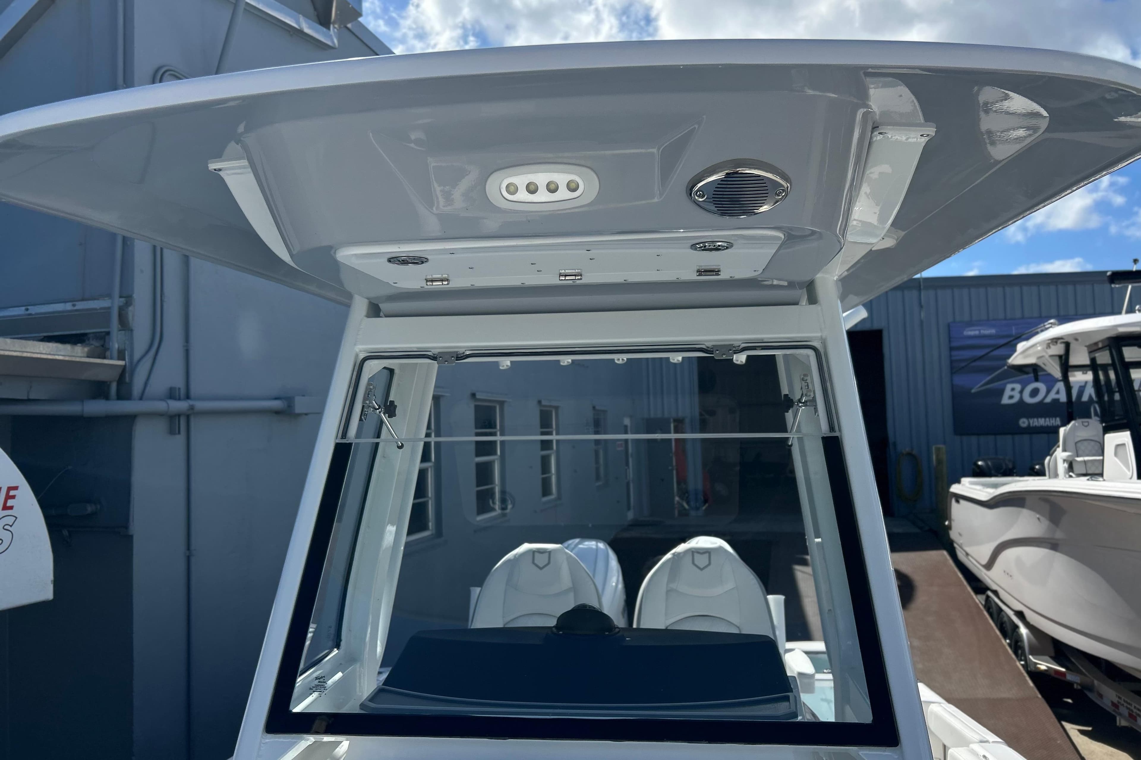2026 Sea Fox 268 Commander boat with modern helm and overhead console.
