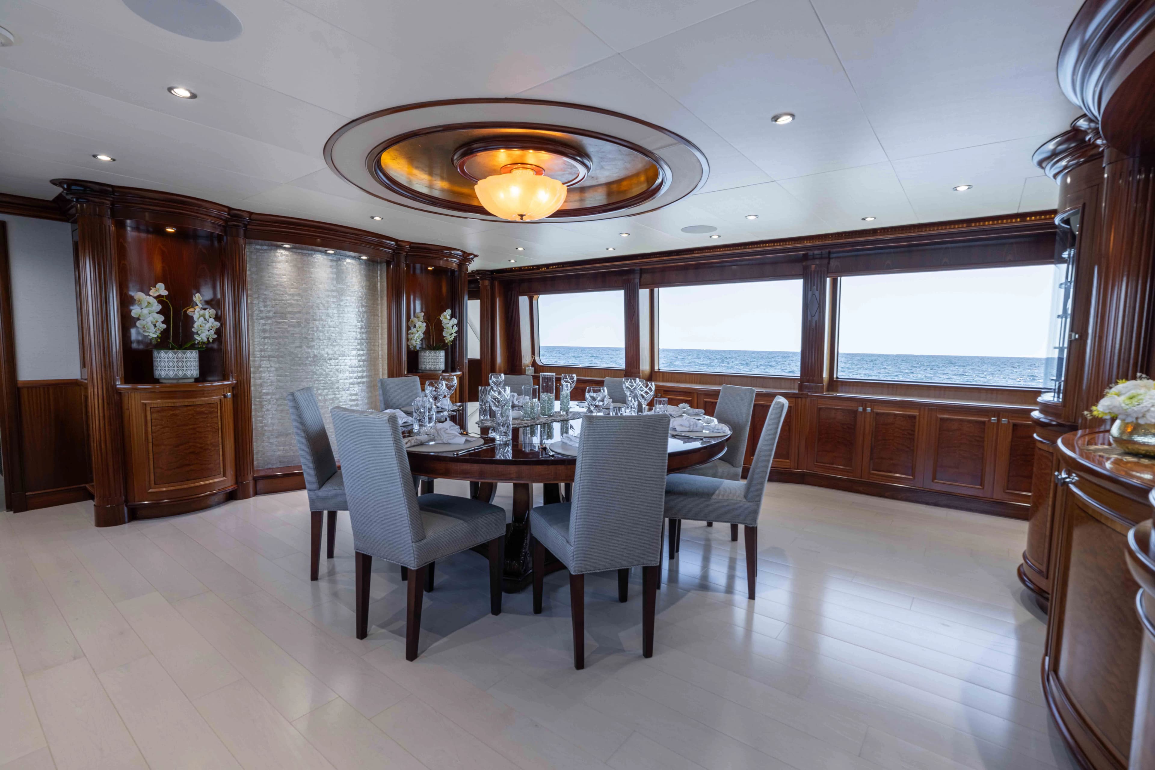 Luxurious dining room on Richmond Yacht 2008 with ocean view.