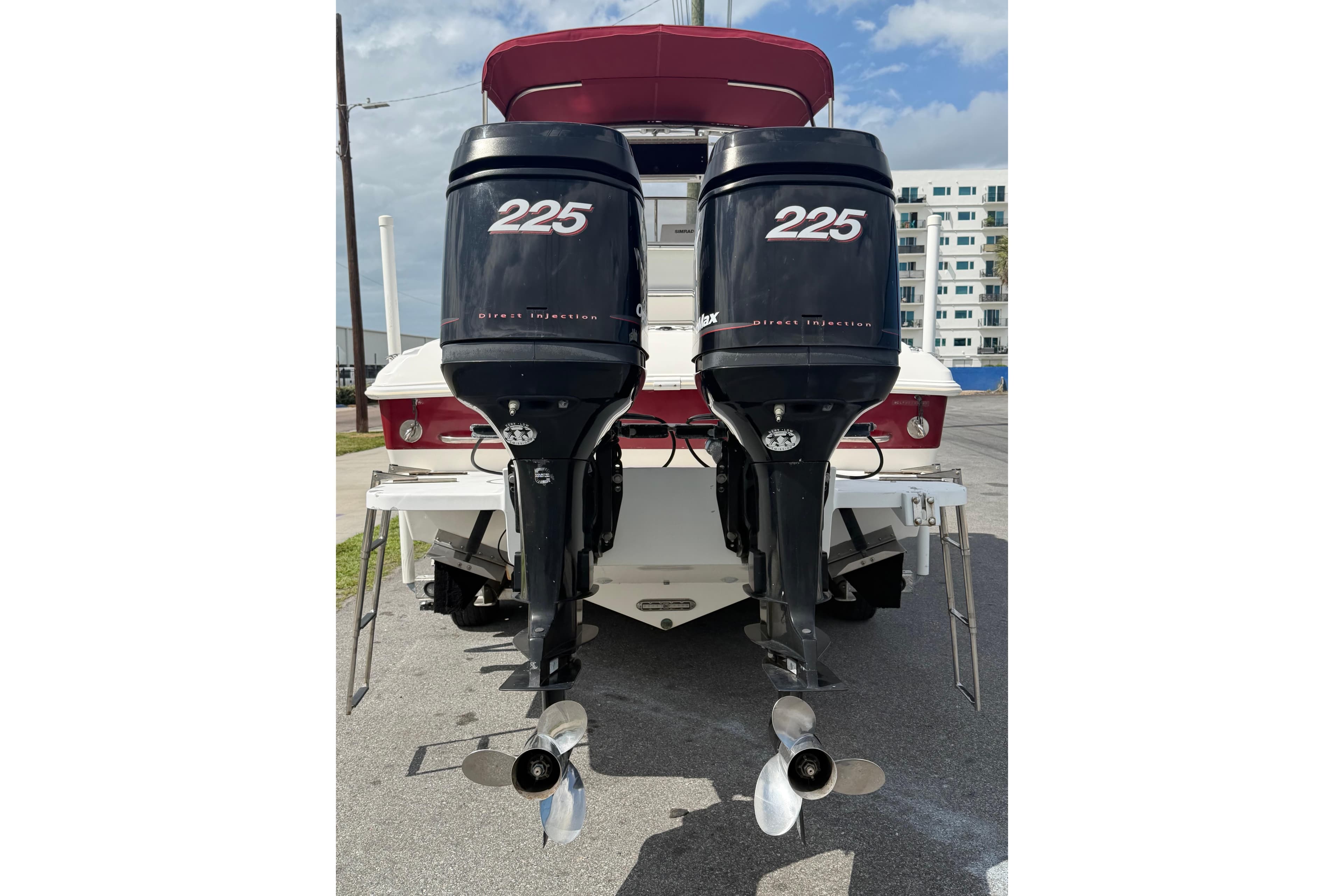 1997 Wellcraft 302 Scarab Sport with twin 225 horsepower outboard engines.